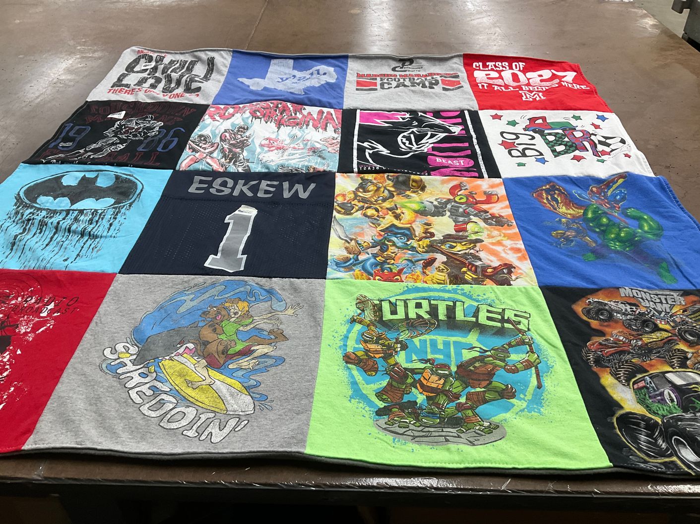 T-shirt quilt with cartoons, video games themes by Leslie from TX