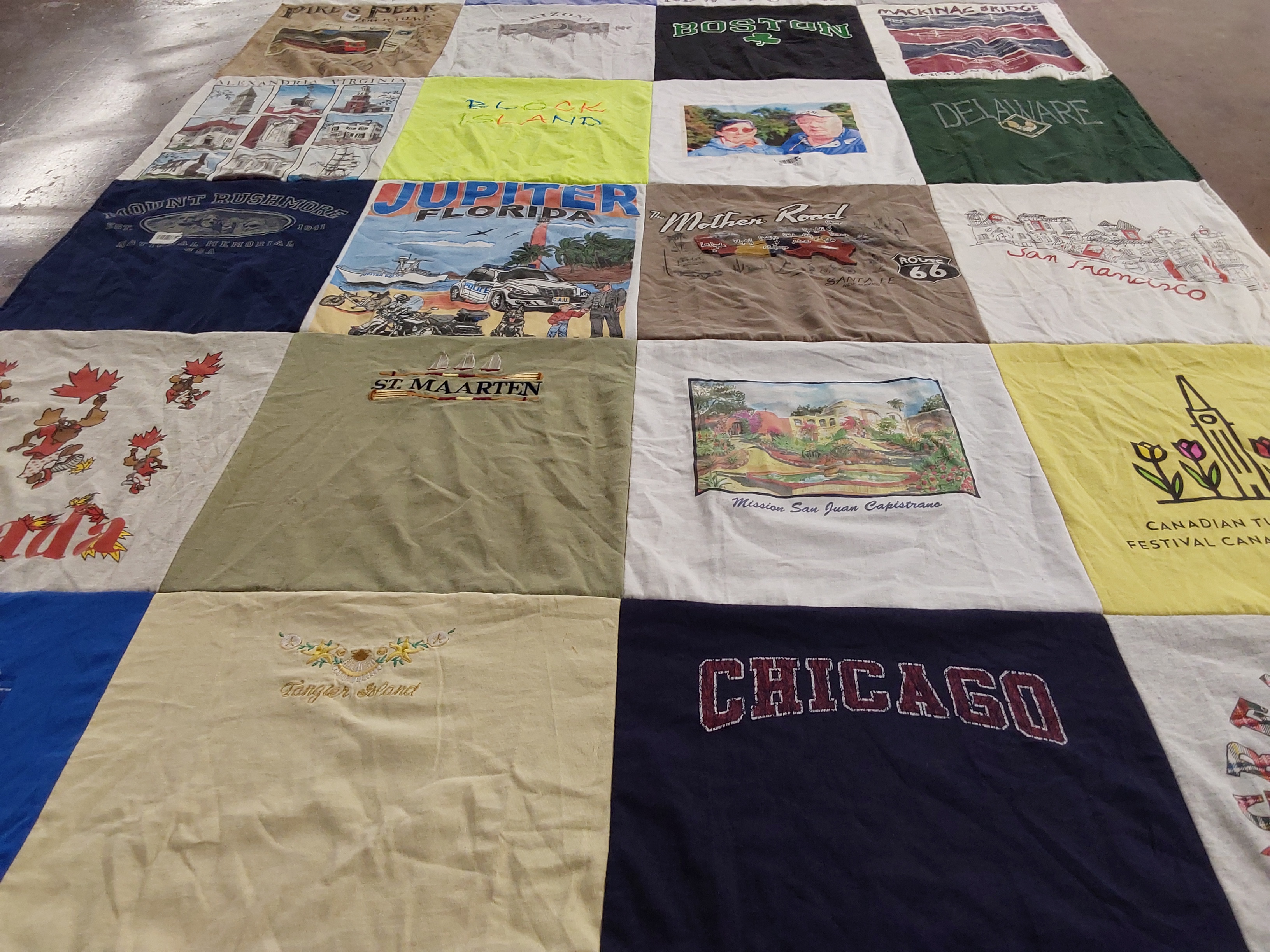 T-shirt quilt with travel, tourism themes by Christine from VA