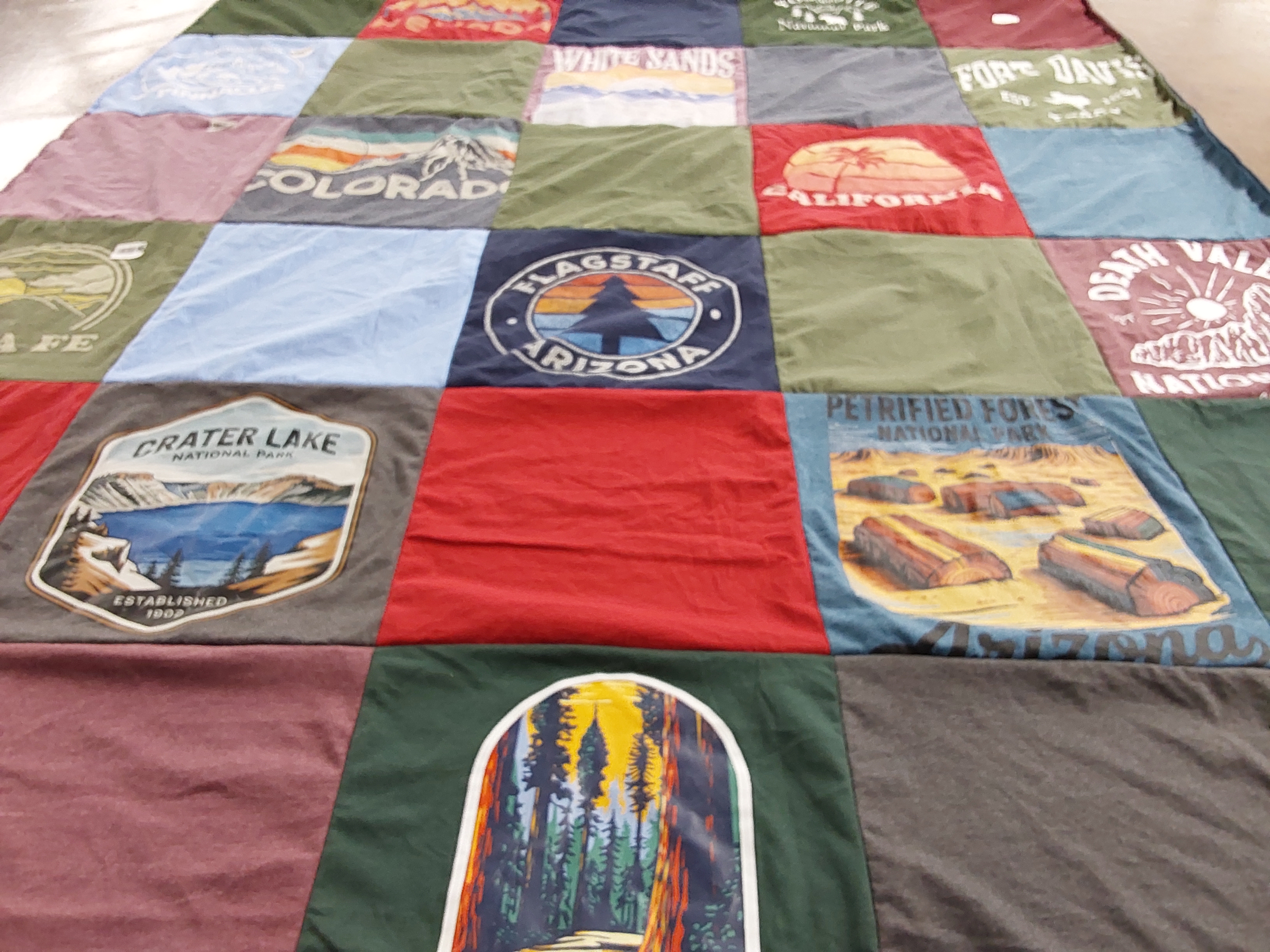 T-shirt quilt with national parks, outdoor activities themes by Laras from TX