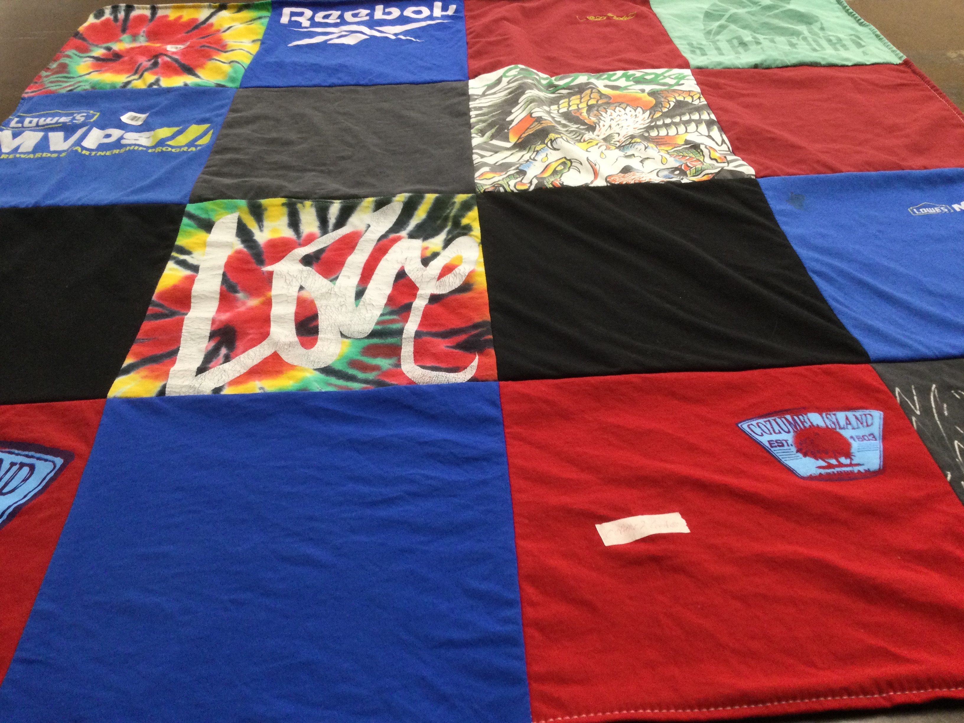 T-shirt quilt with sports, crafts themes by Stacy from LA