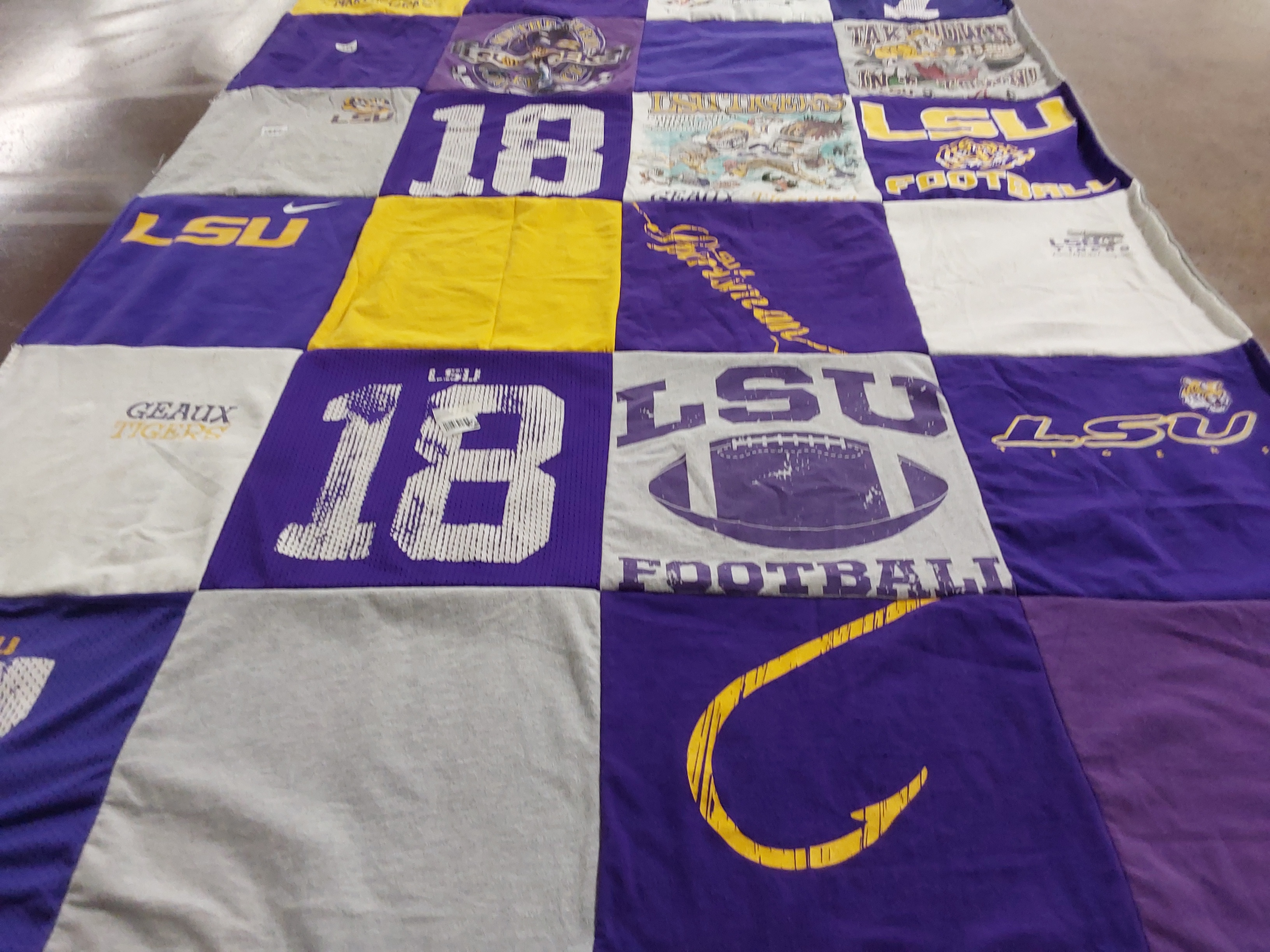 T-shirt quilt featuring louisiana state university football by Suzy from TX