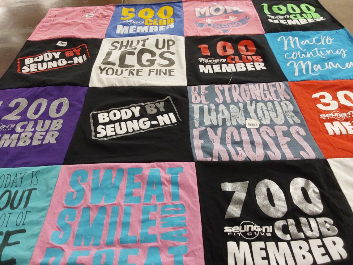 T-shirt quilt with fitness, wellness themes by Kim from MI