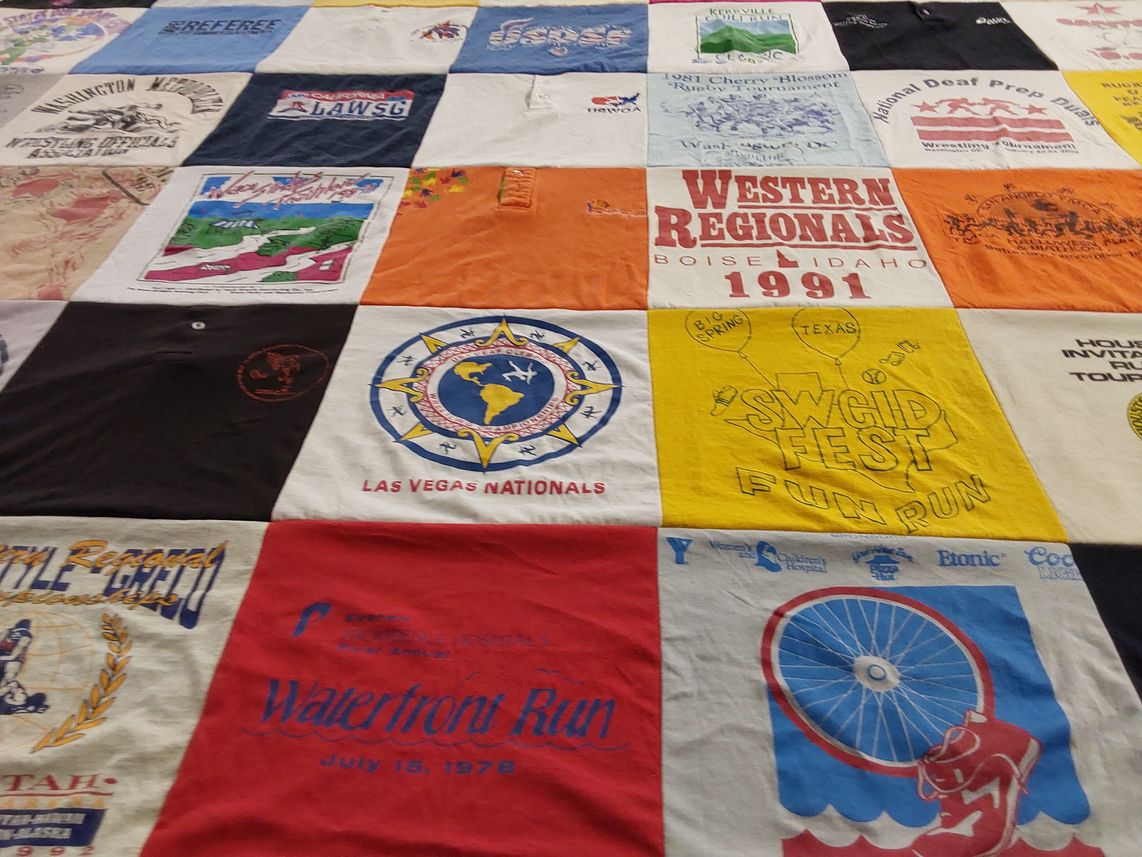 T-shirt quilt with running, sports themes by Julianna from CA