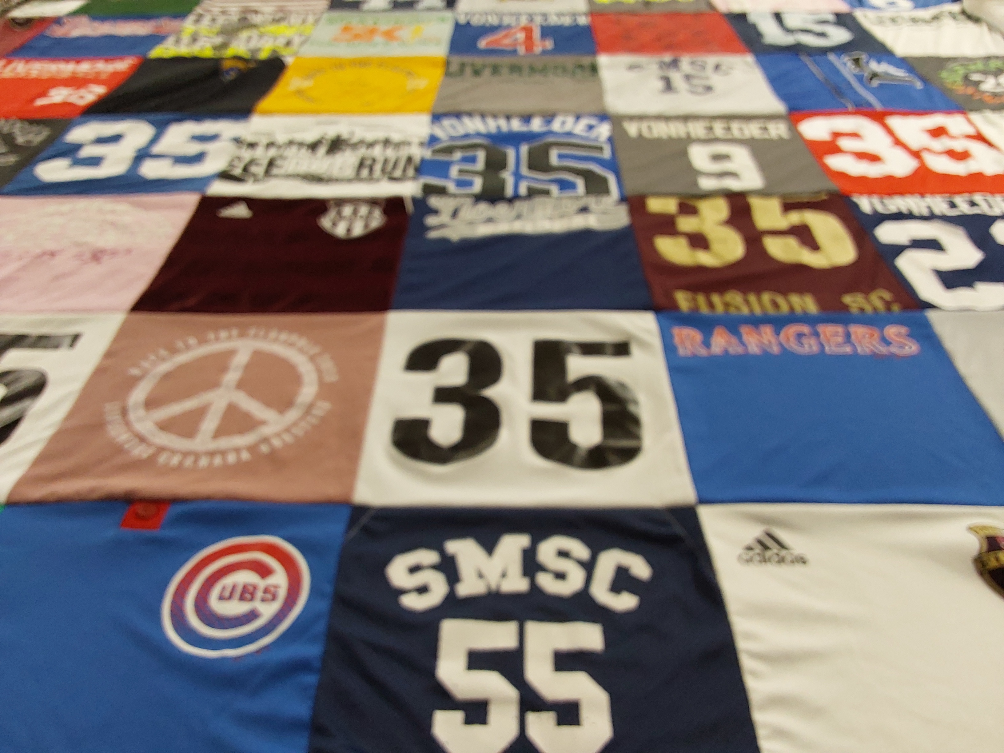 T-shirt quilt with sports, soccer themes by Dave from CA