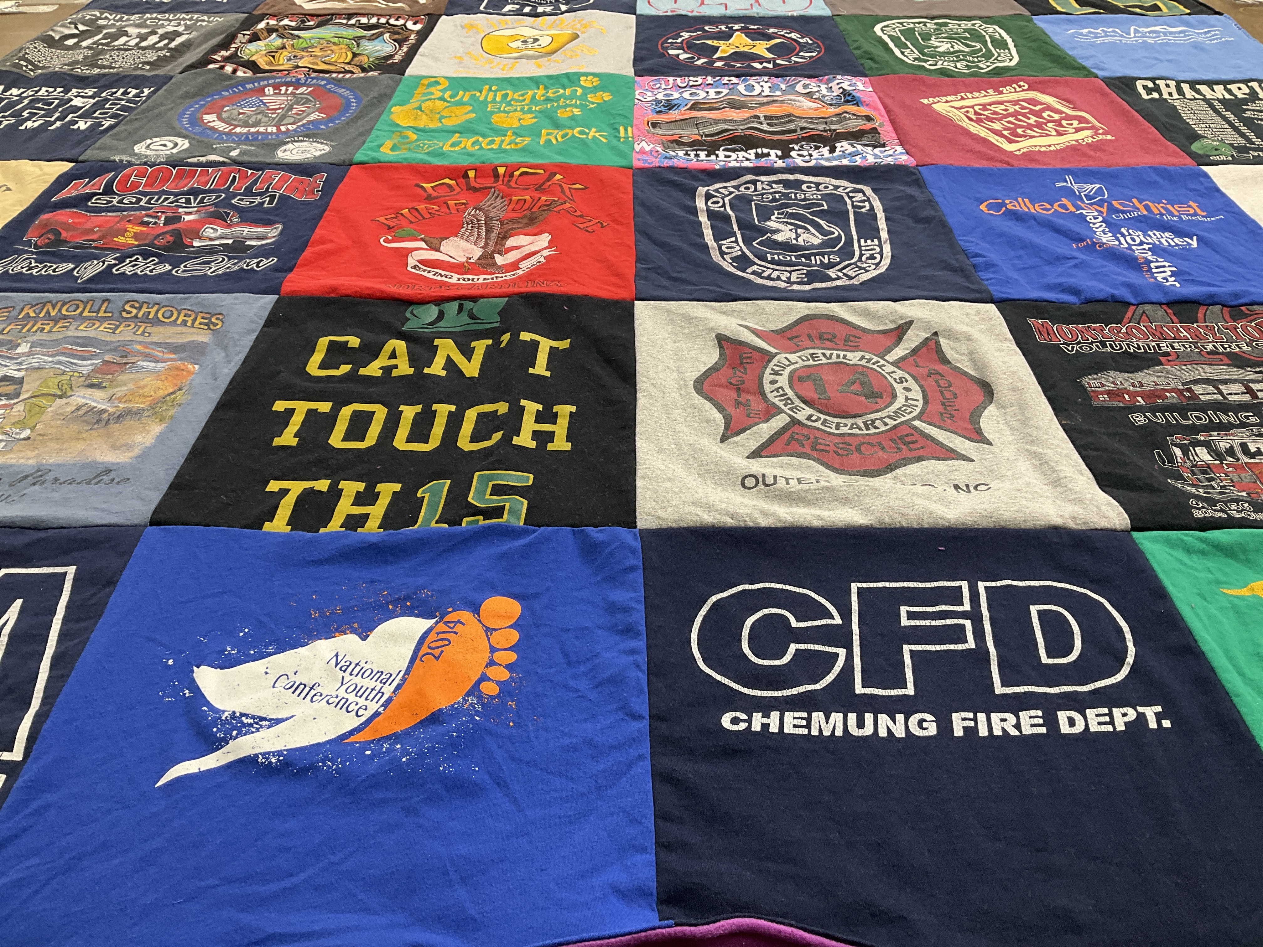 T-shirt quilt with firefighting, youth programs themes by Kelsey from VA
