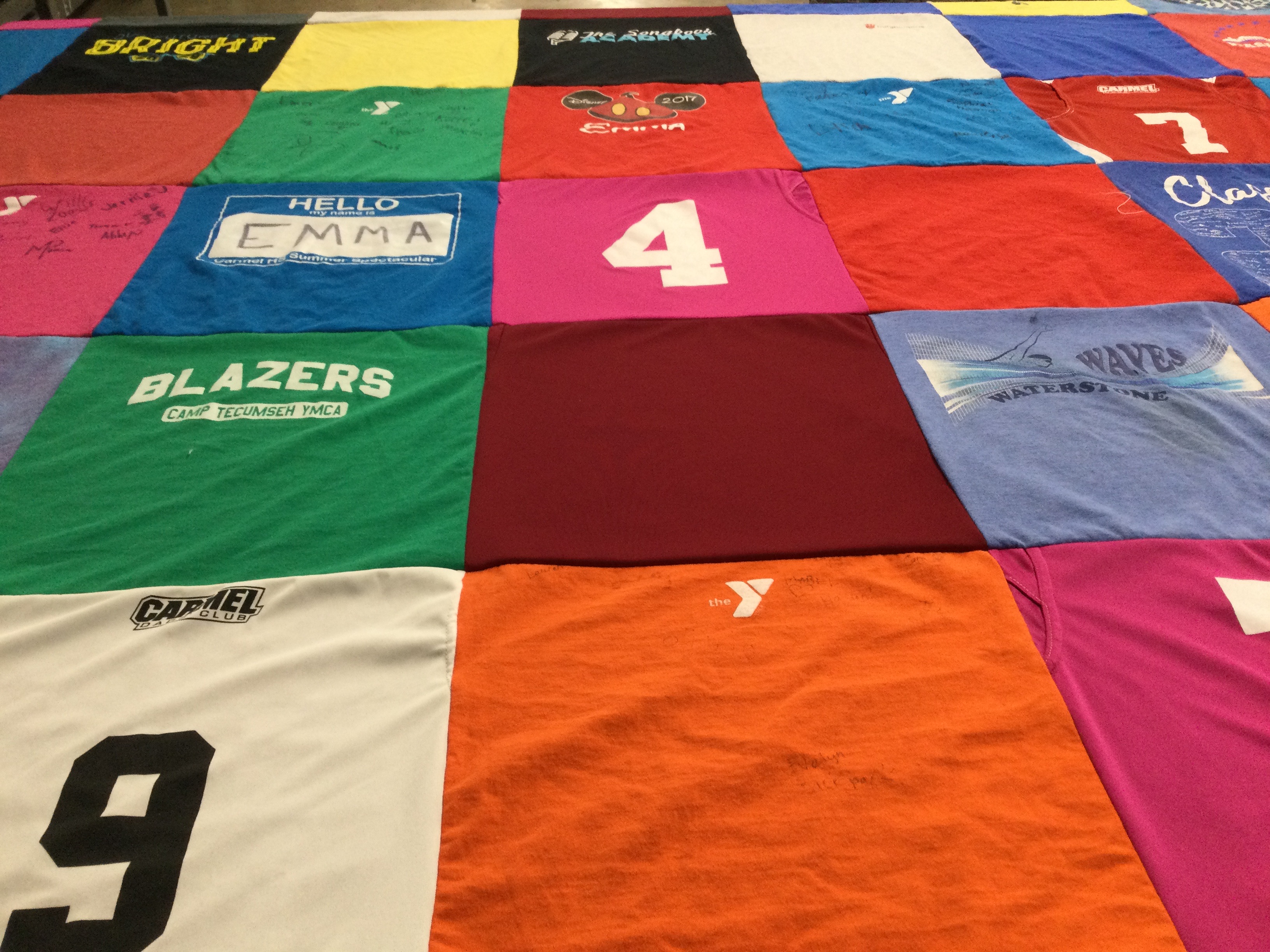 T-shirt quilt with camping, youth activities themes by Jennifer from IN