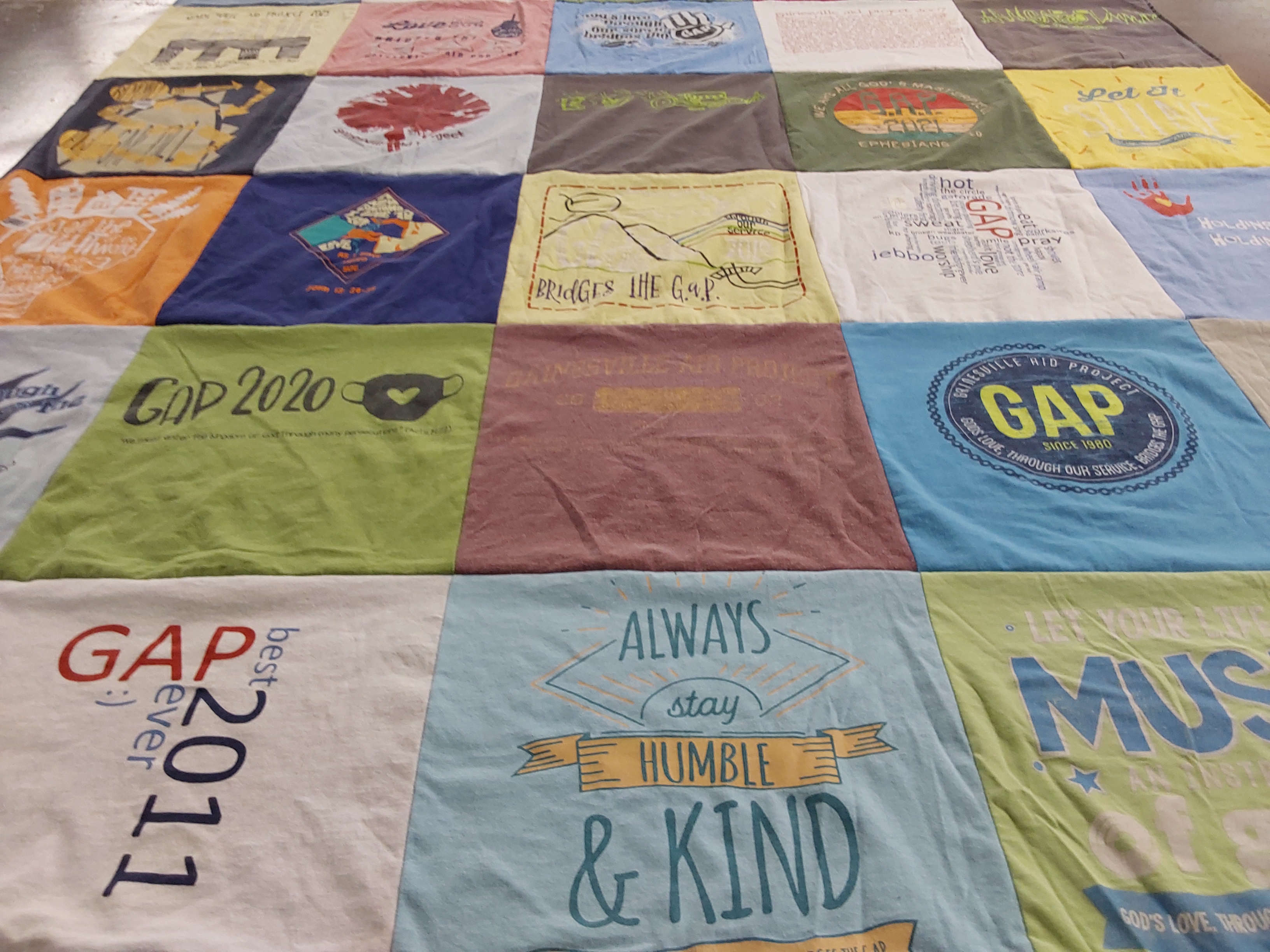 T-shirt quilt with volunteering, service themes by Sonya from GA