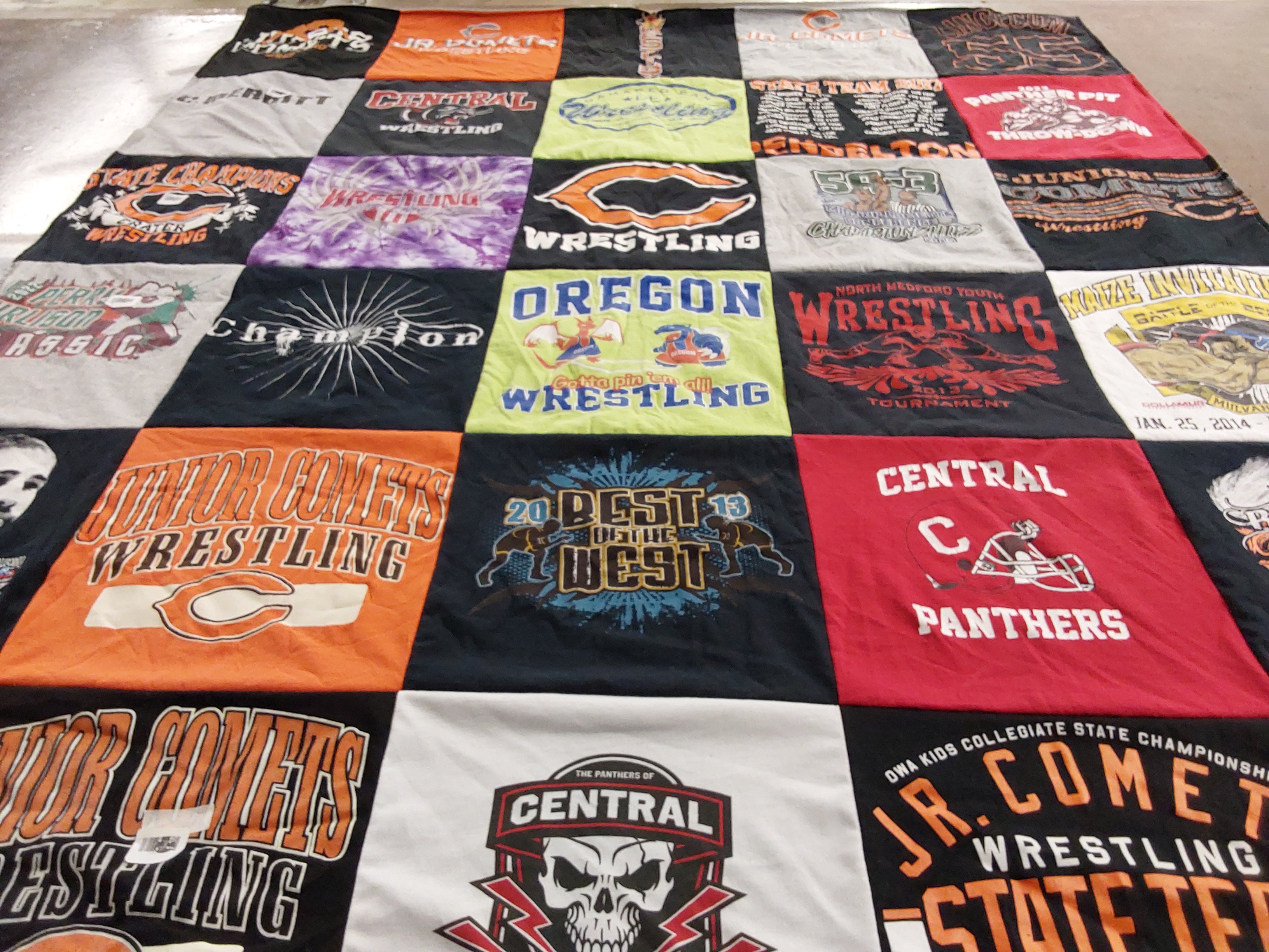 T-shirt quilt featuring junior comets wrestling by Jodi from OR