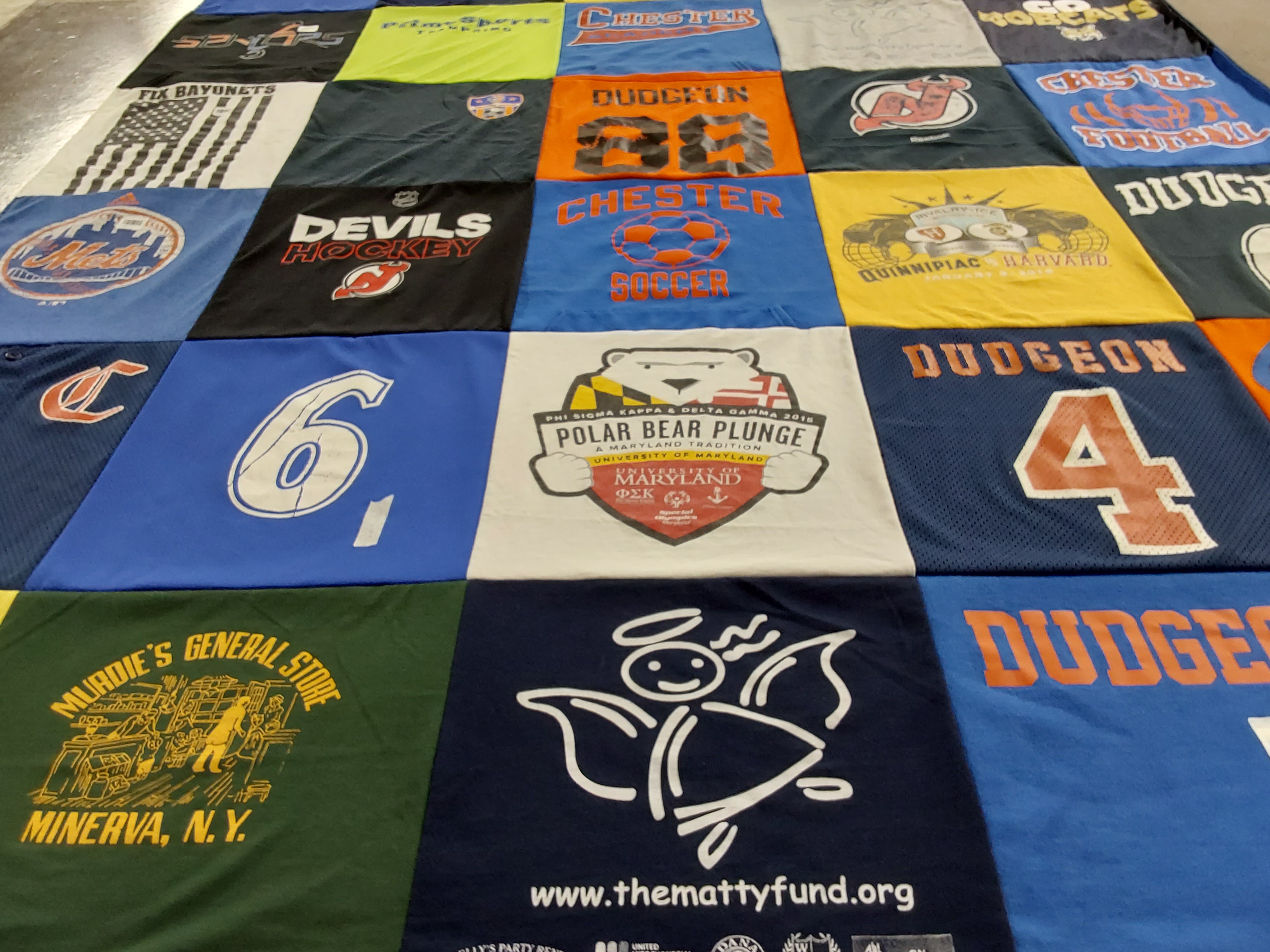 T-shirt quilt featuring new jersey devils, chester soccer by Gina from NY