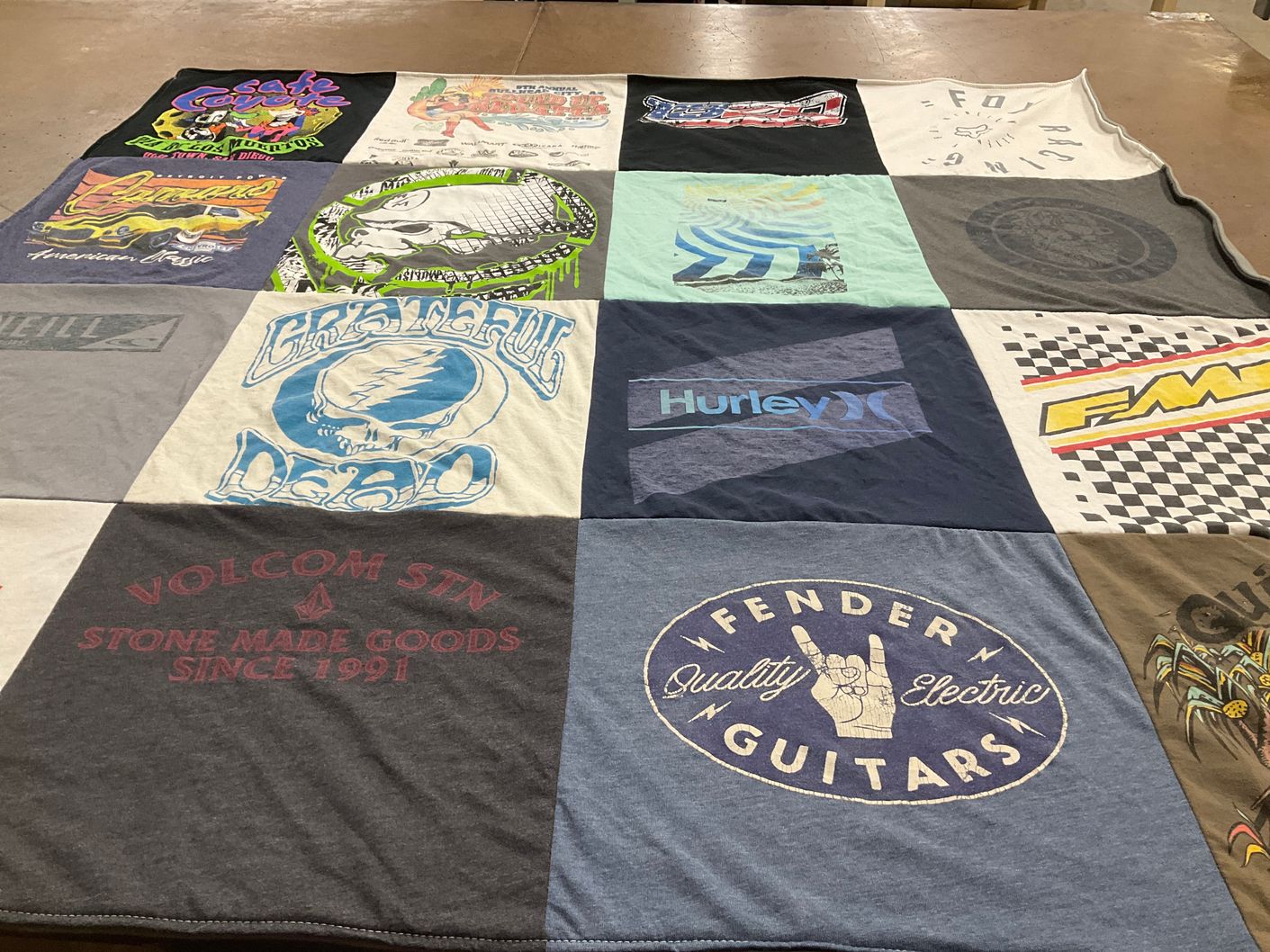 T-shirt quilt with music, skateboarding themes by Stacy from CA