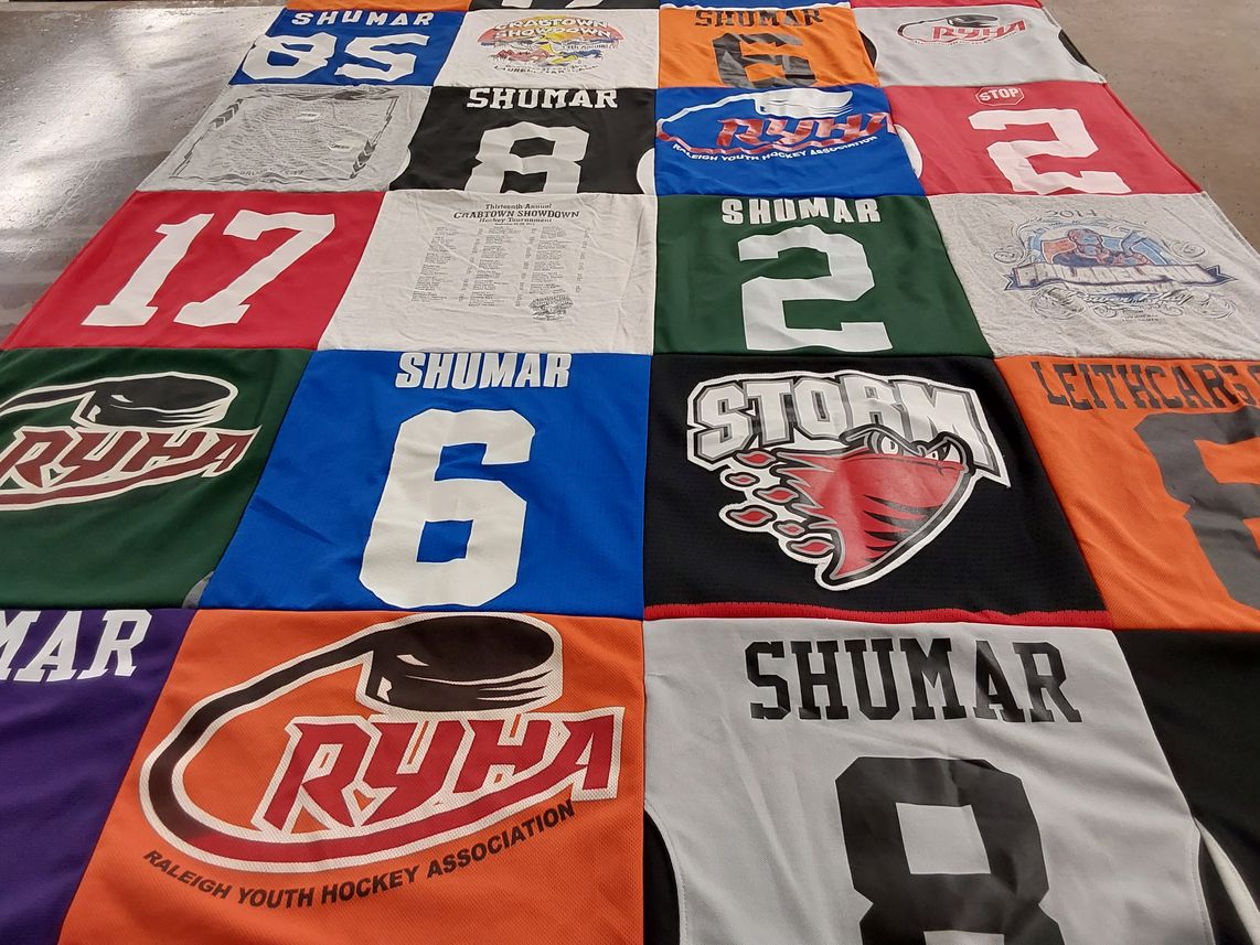 T-shirt quilt with hockey, sports themes by Kimberly from NC