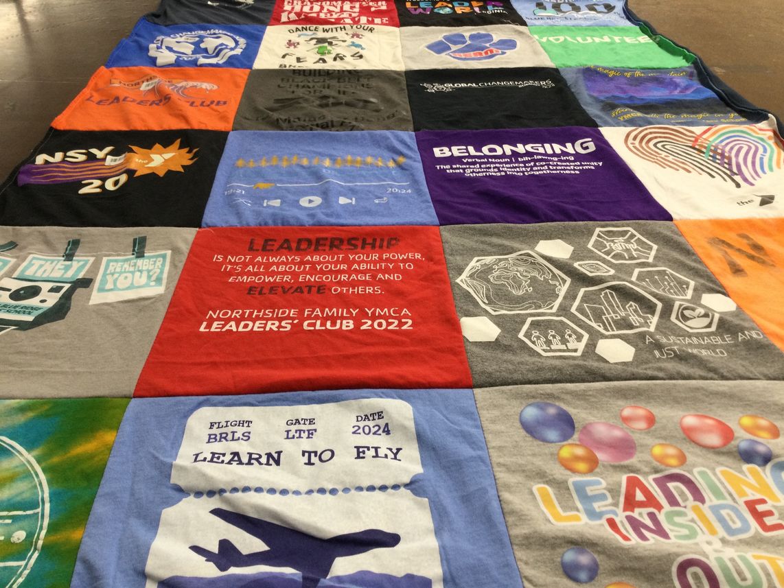 T-shirt quilt with leadership, community themes by Carol from VA