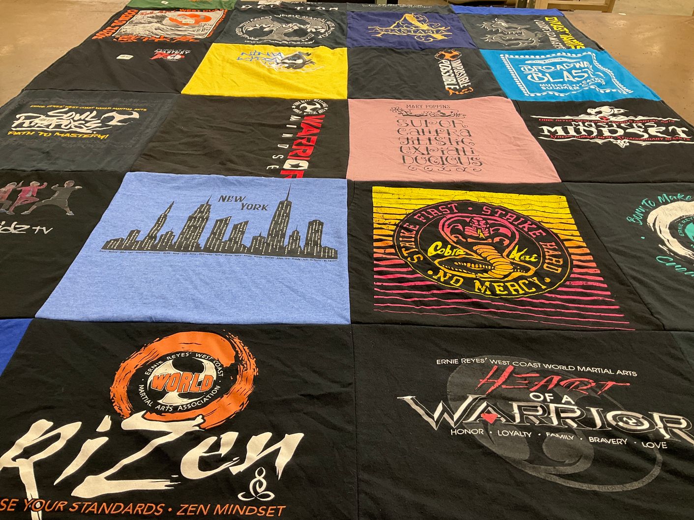 T-shirt quilt with martial arts, theater themes by Natalie from UT