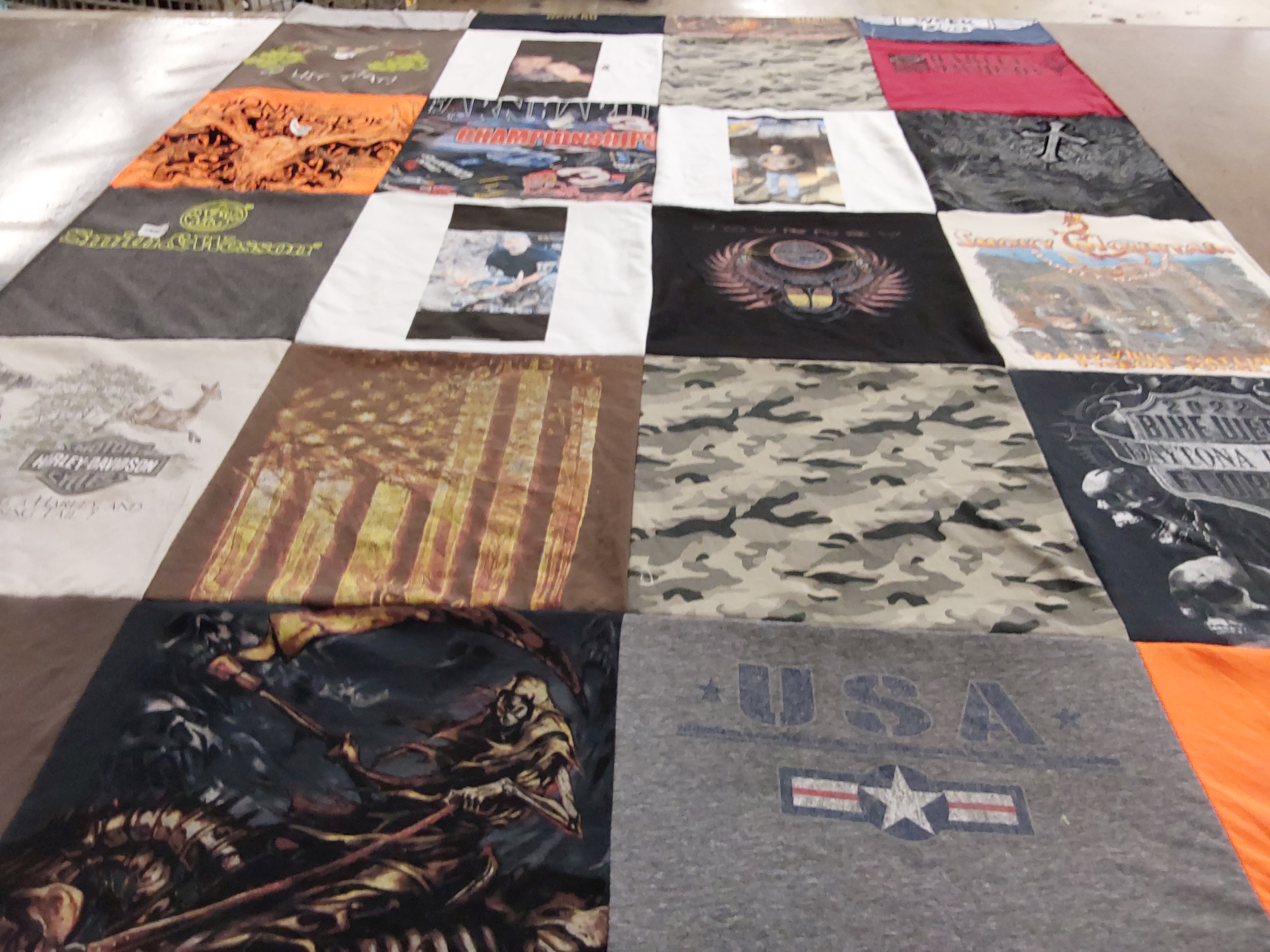 T-shirt quilt with motorcycles, hunting themes by Ashley from OH