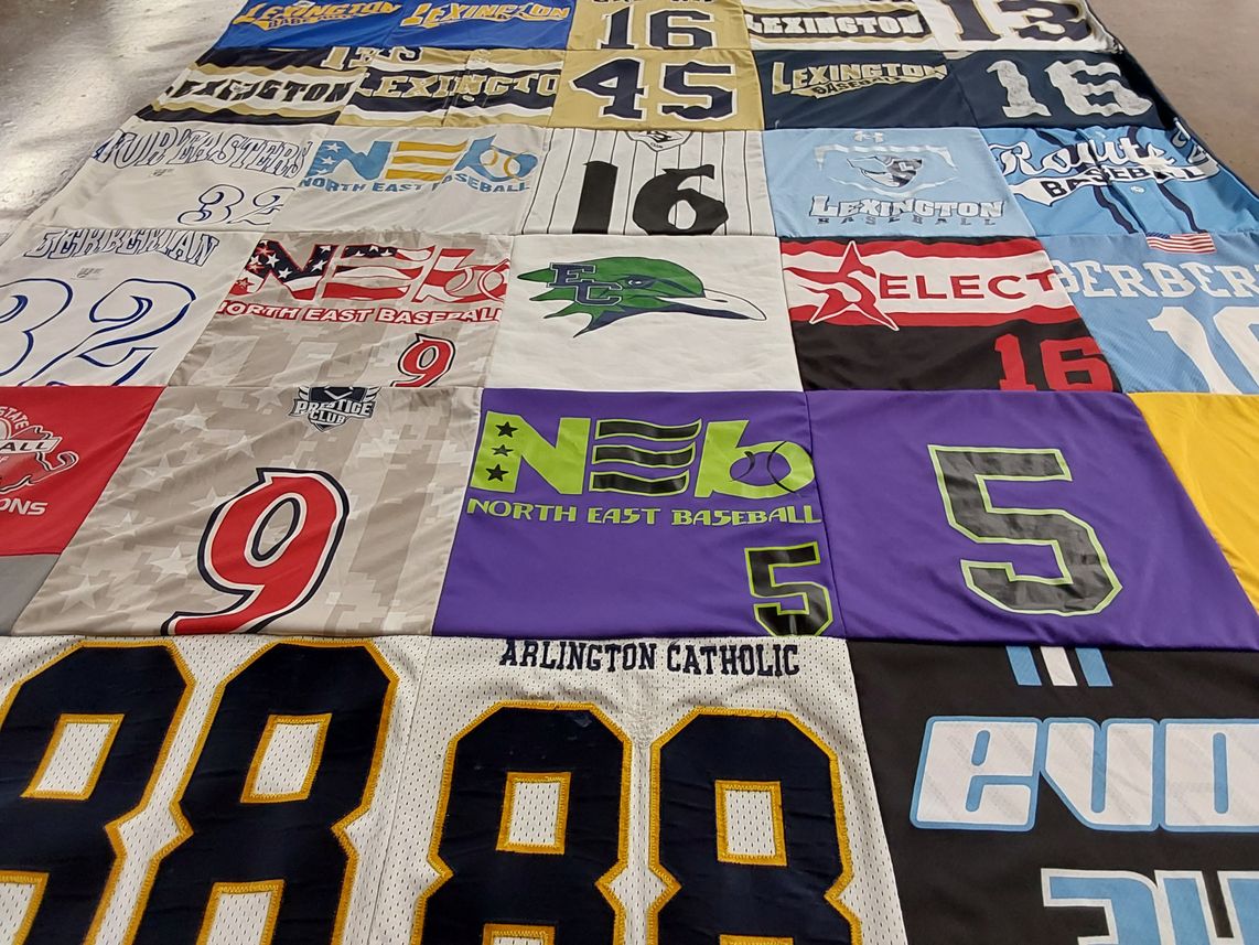 T-shirt quilt with shopping, sustainability themes by Stasia from IN