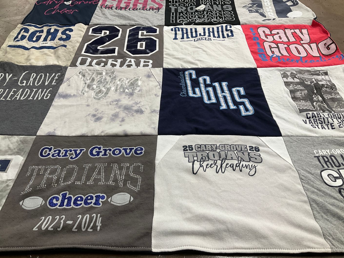 T-shirt quilt featuring cary grove trojans cheer by Rachael from IL