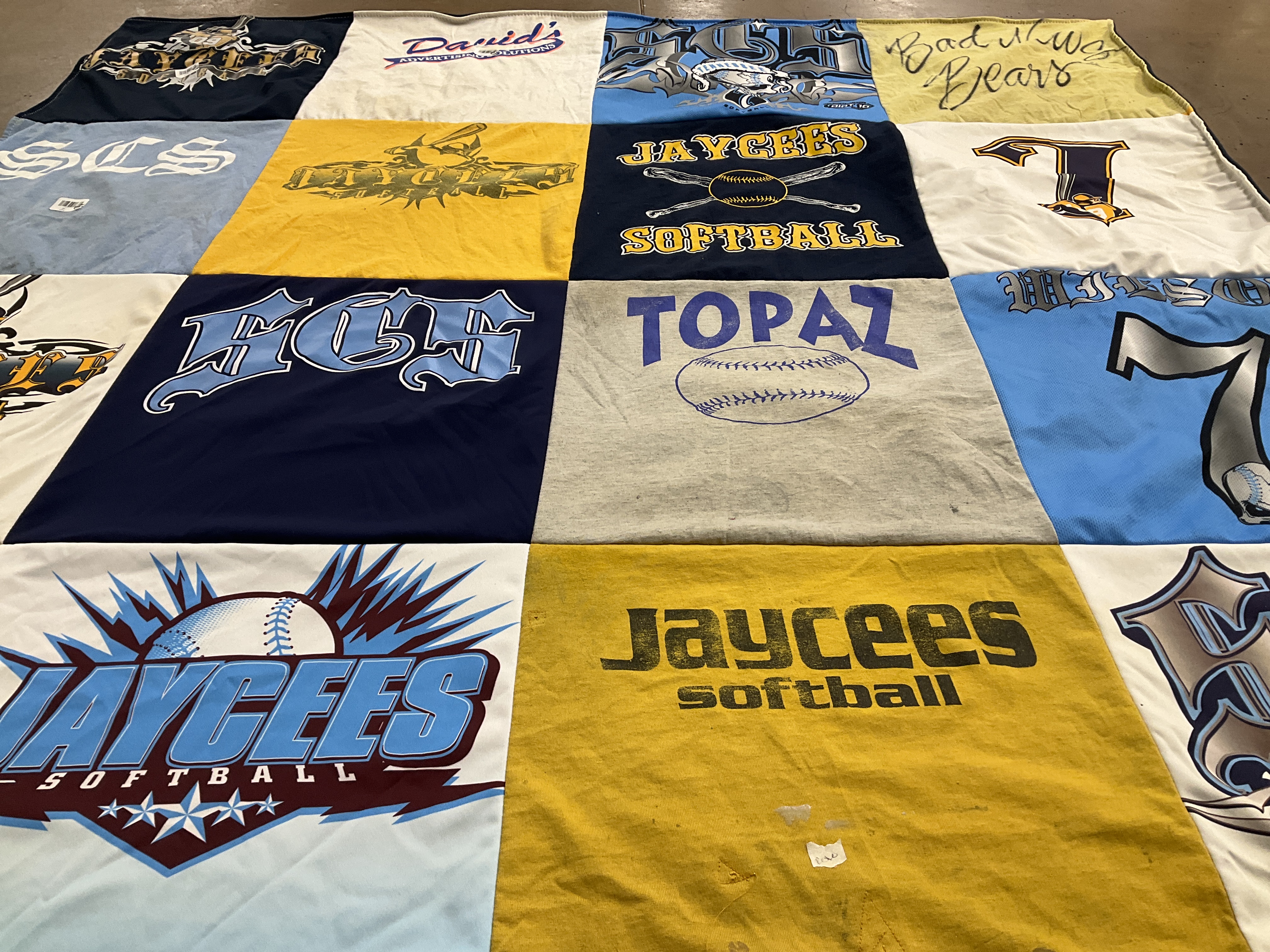 T-shirt quilt with sports, softball themes by Delores from TN