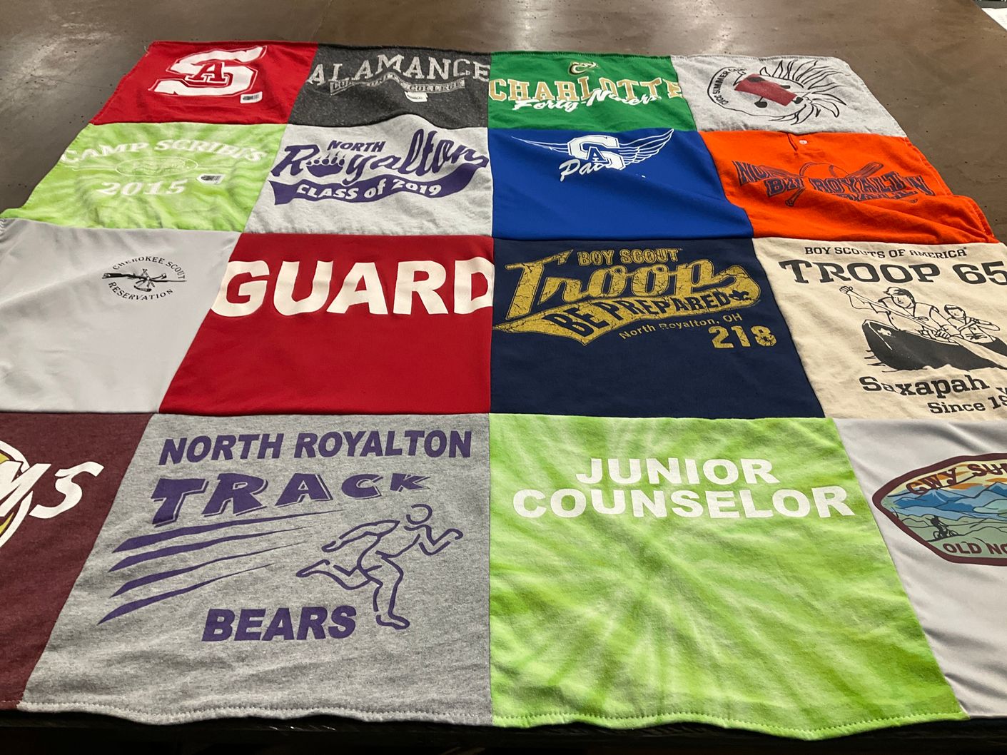 T-shirt quilt featuring north royalton track bear by Heather from NC