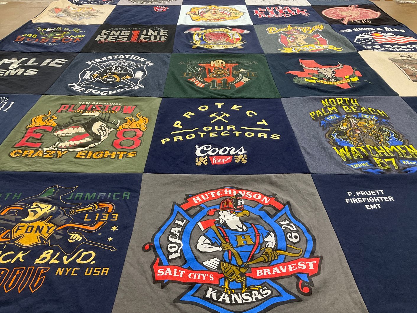 T-shirt quilt with firefighting, community service themes by Kyleigh from TX