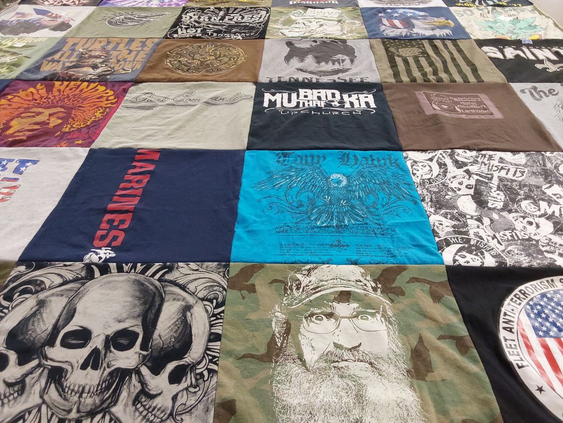 T-shirt quilt with music, military themes by Delores from TN