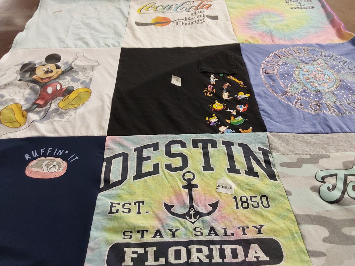 T-shirt quilt with disney, beaches themes by Sandra from TN