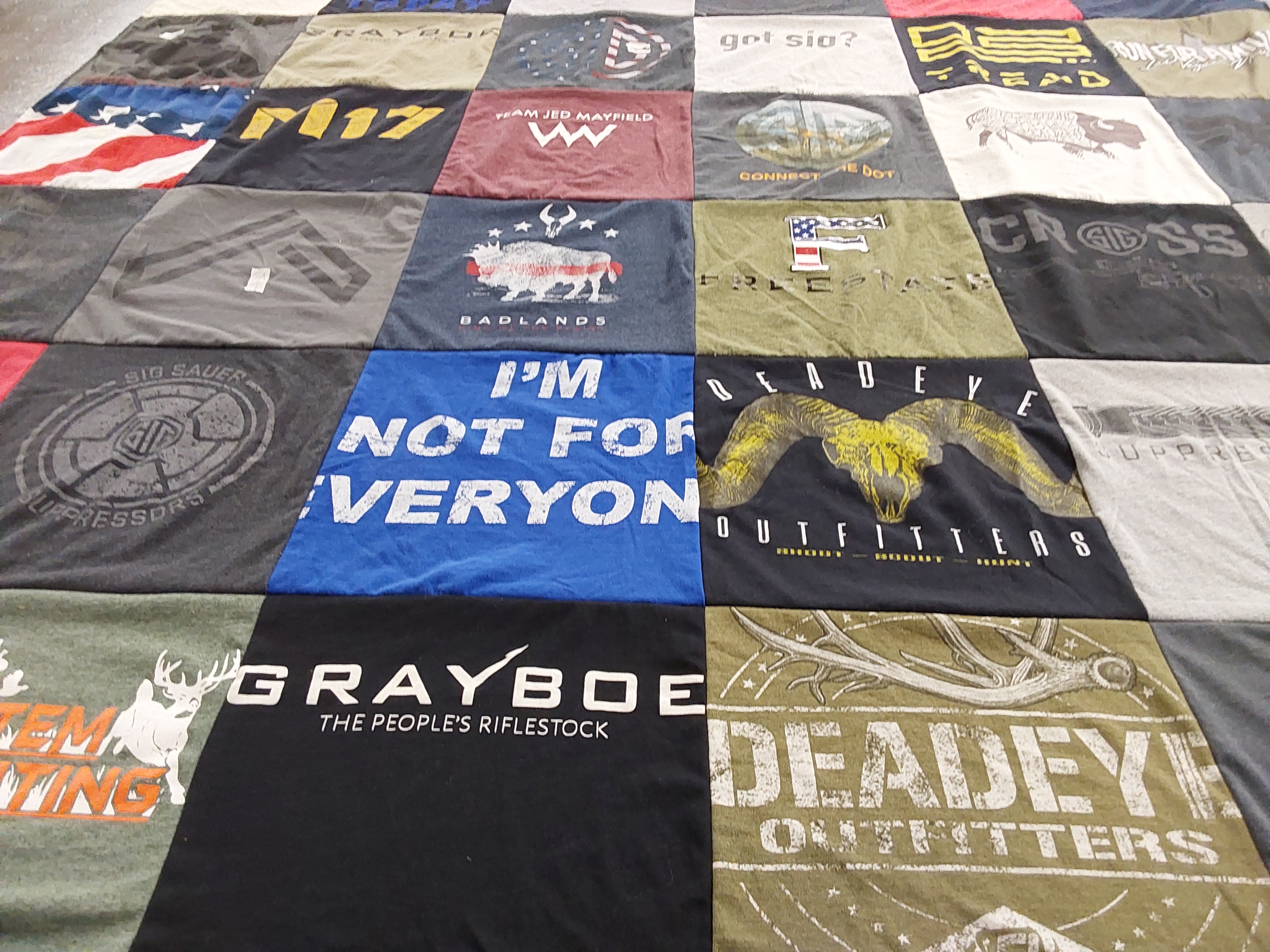 T-shirt quilt with hunting, outdoor themes by Wayne from AZ