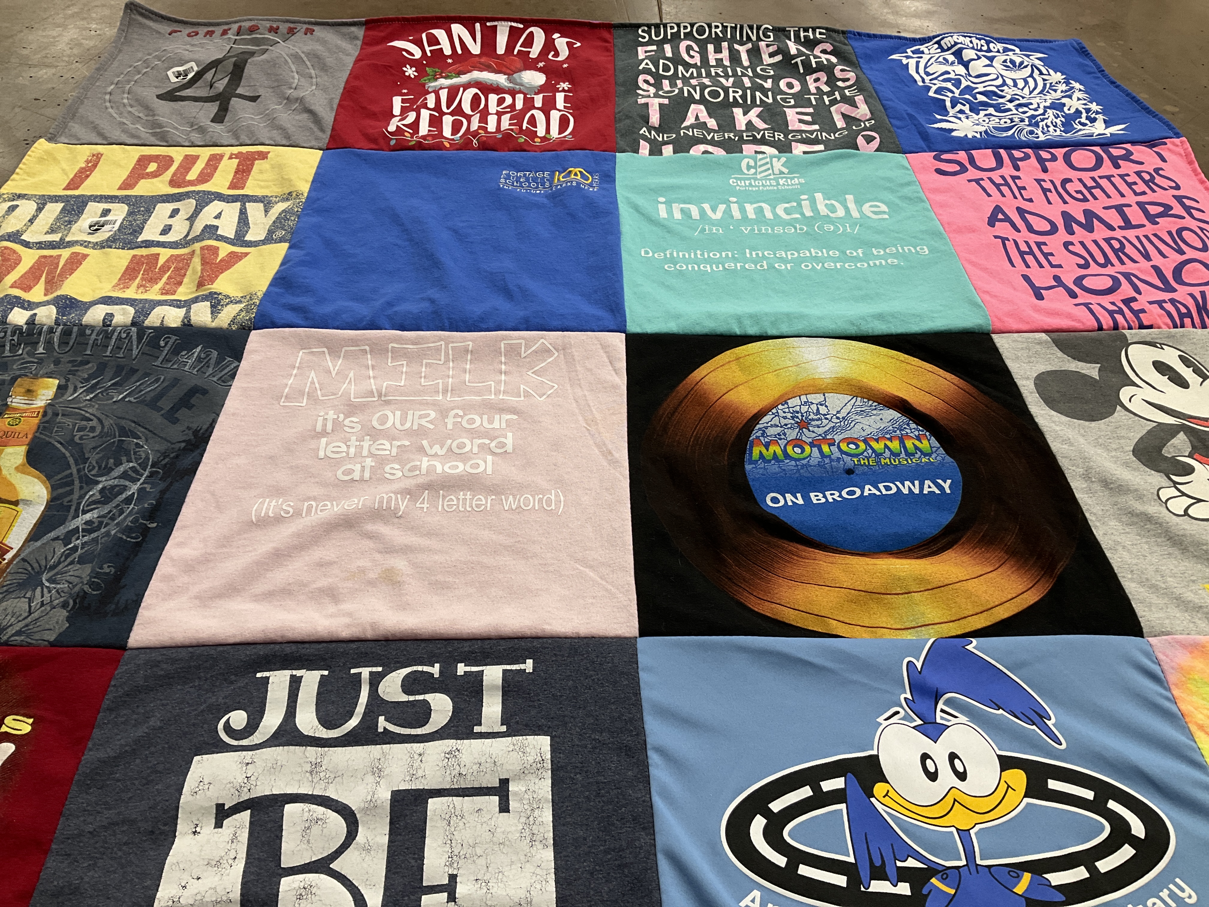 T-shirt quilt with music, education themes by Linda from MI