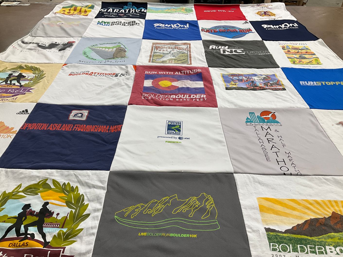 T-shirt quilt with running, sports themes by Eric from FL