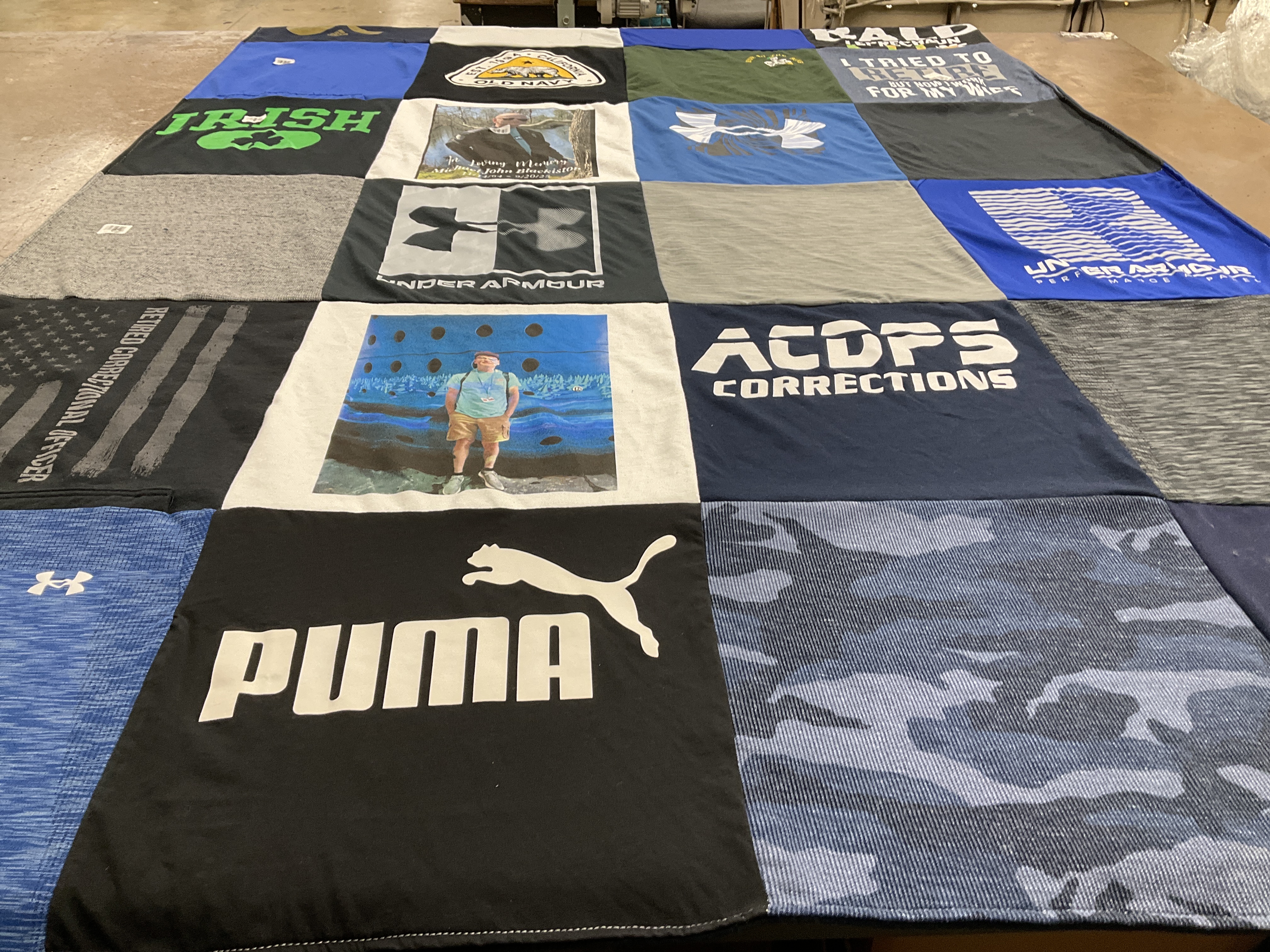 T-shirt quilt with sports, military themes by Holly from NJ