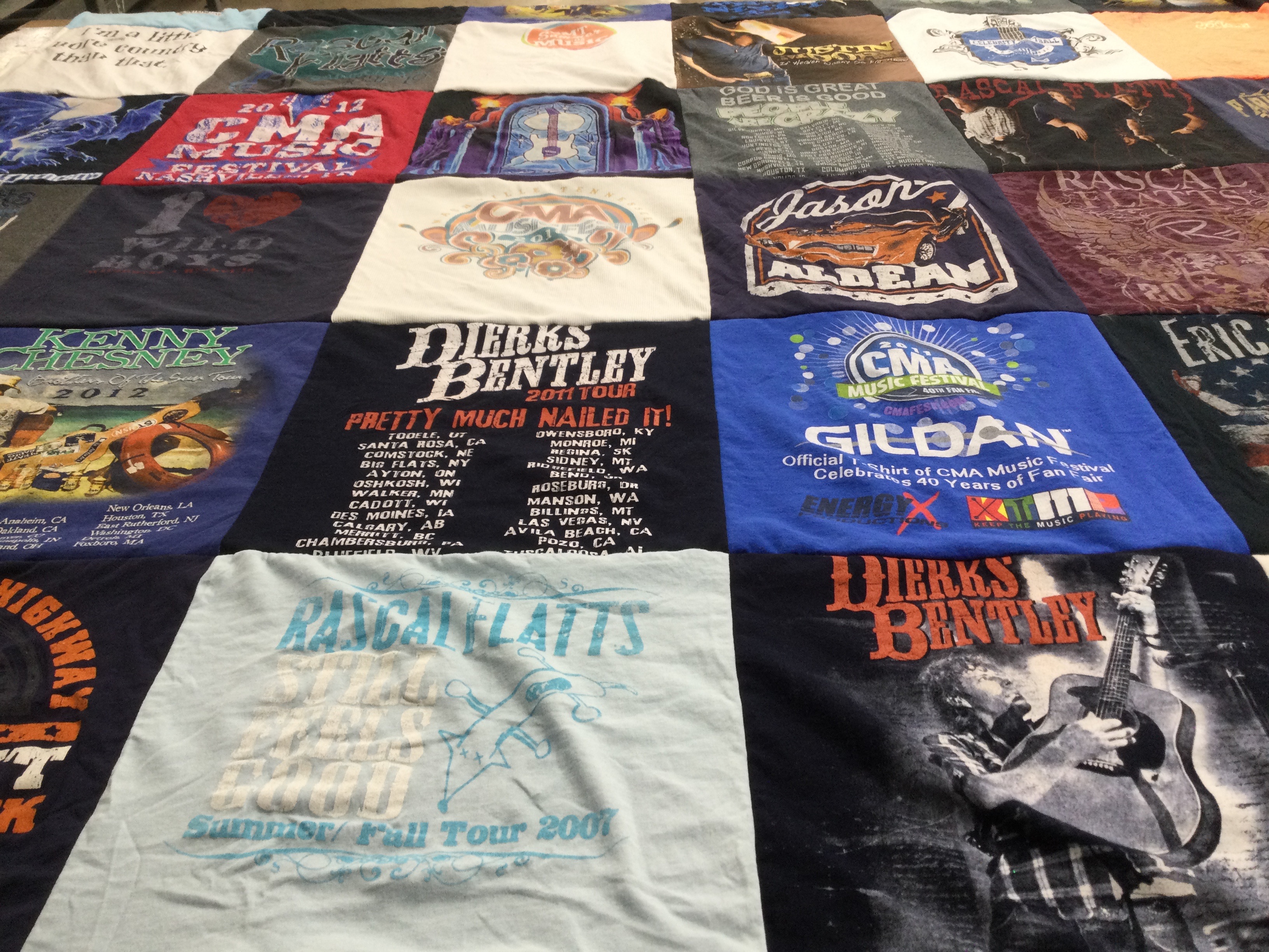 T-shirt quilt with country music, concerts themes by Denise from NC