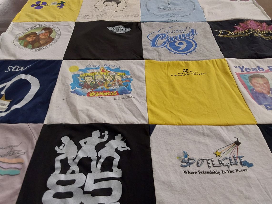 T-shirt quilt with music, entertainment themes by Diane from TN