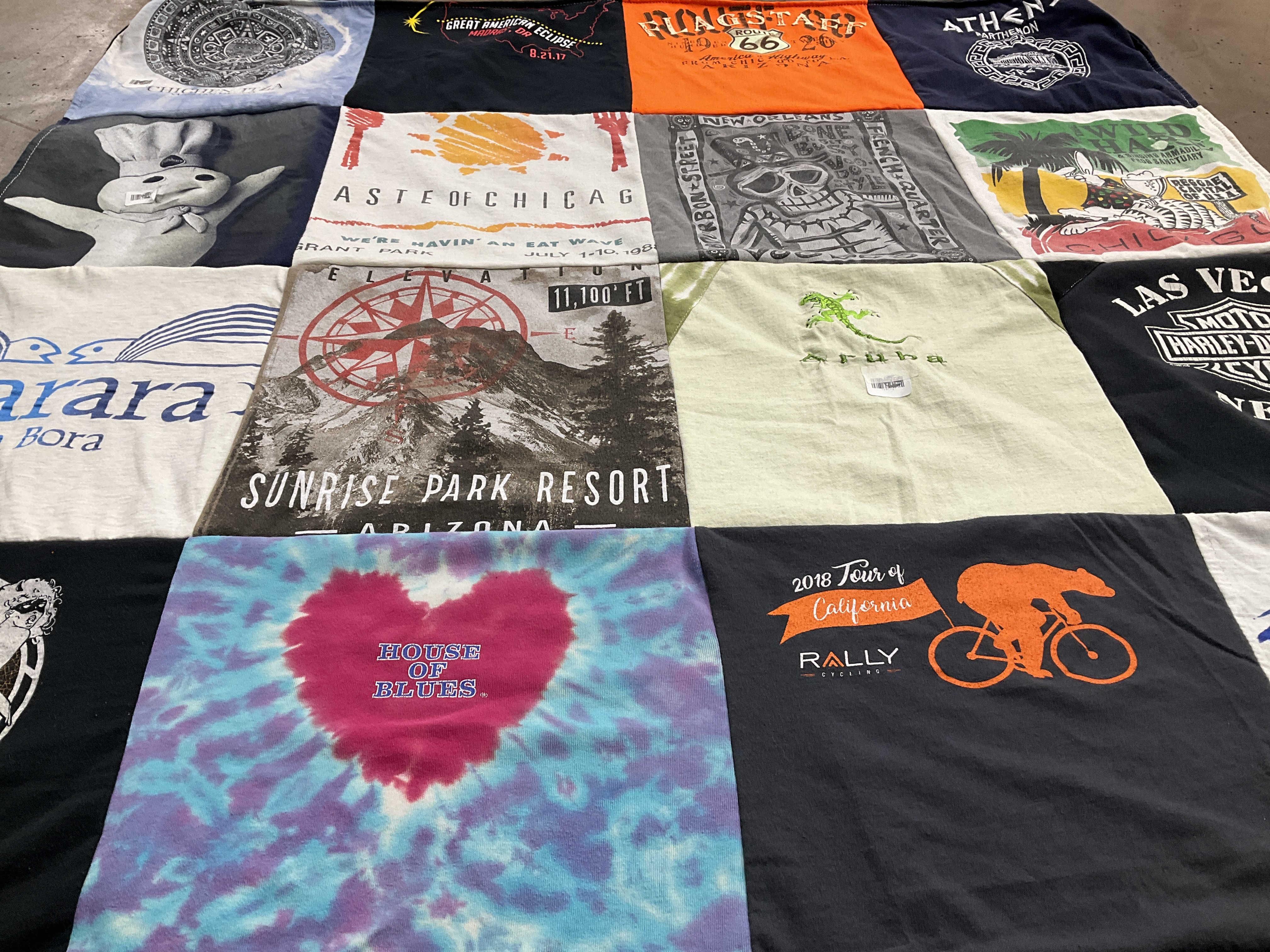 T-shirt quilt with travel, music themes by Marie from AZ