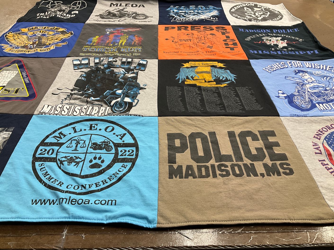 T-shirt quilt with law enforcement, motorcycle clubs themes by John from MS