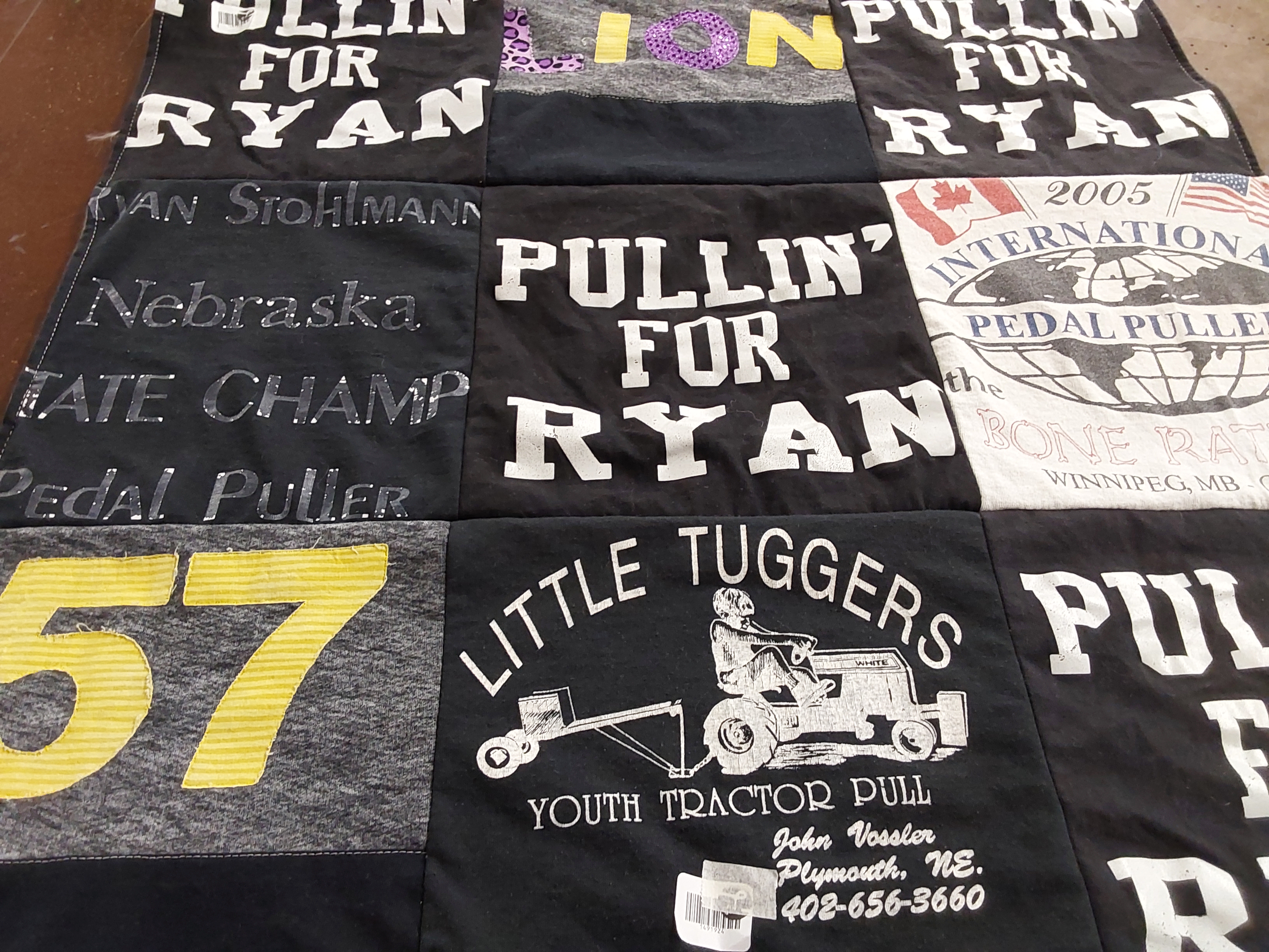 T-shirt quilt with tractor pulling, youth activities themes by Amy from NE