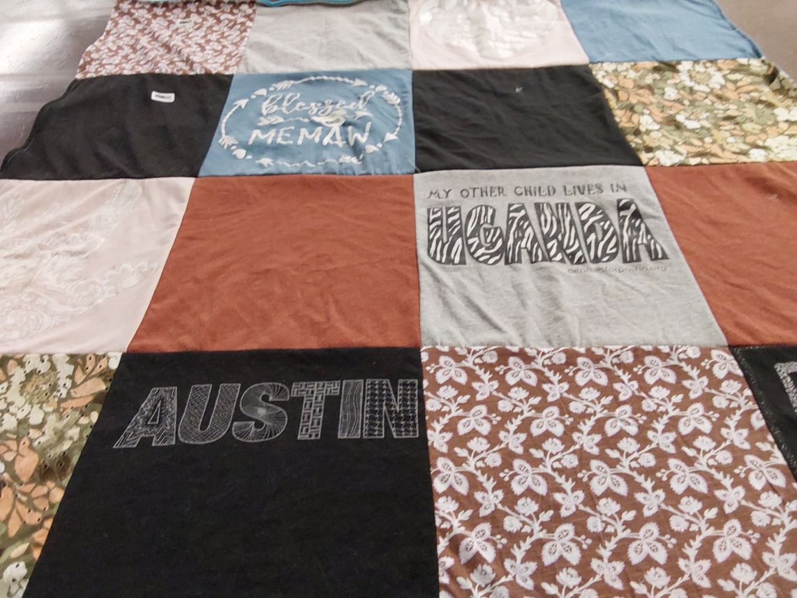 T-shirt quilt with travel, family themes by Tiffany from TN