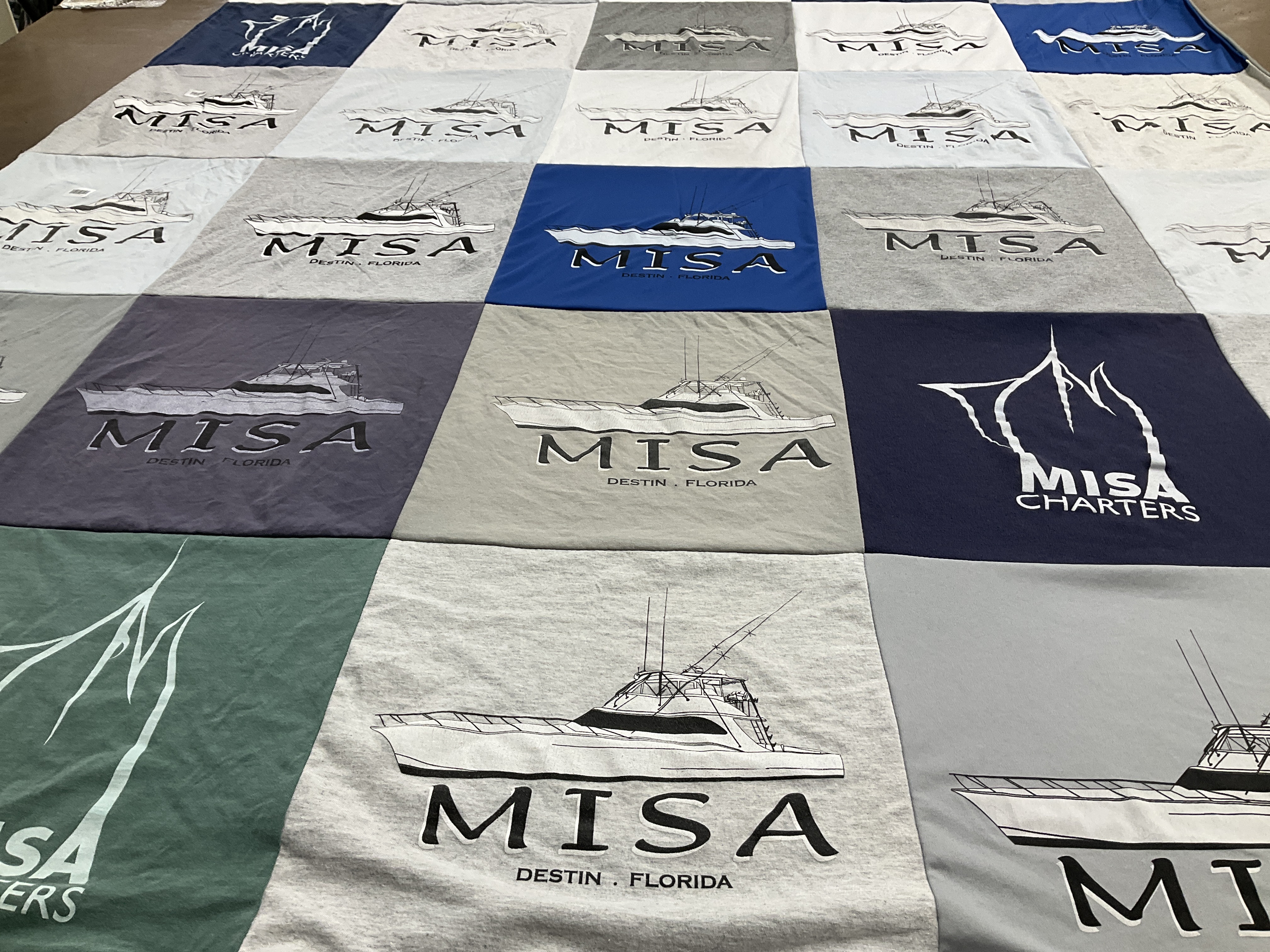 T-shirt quilt with fishing, boating themes by Eric from FL