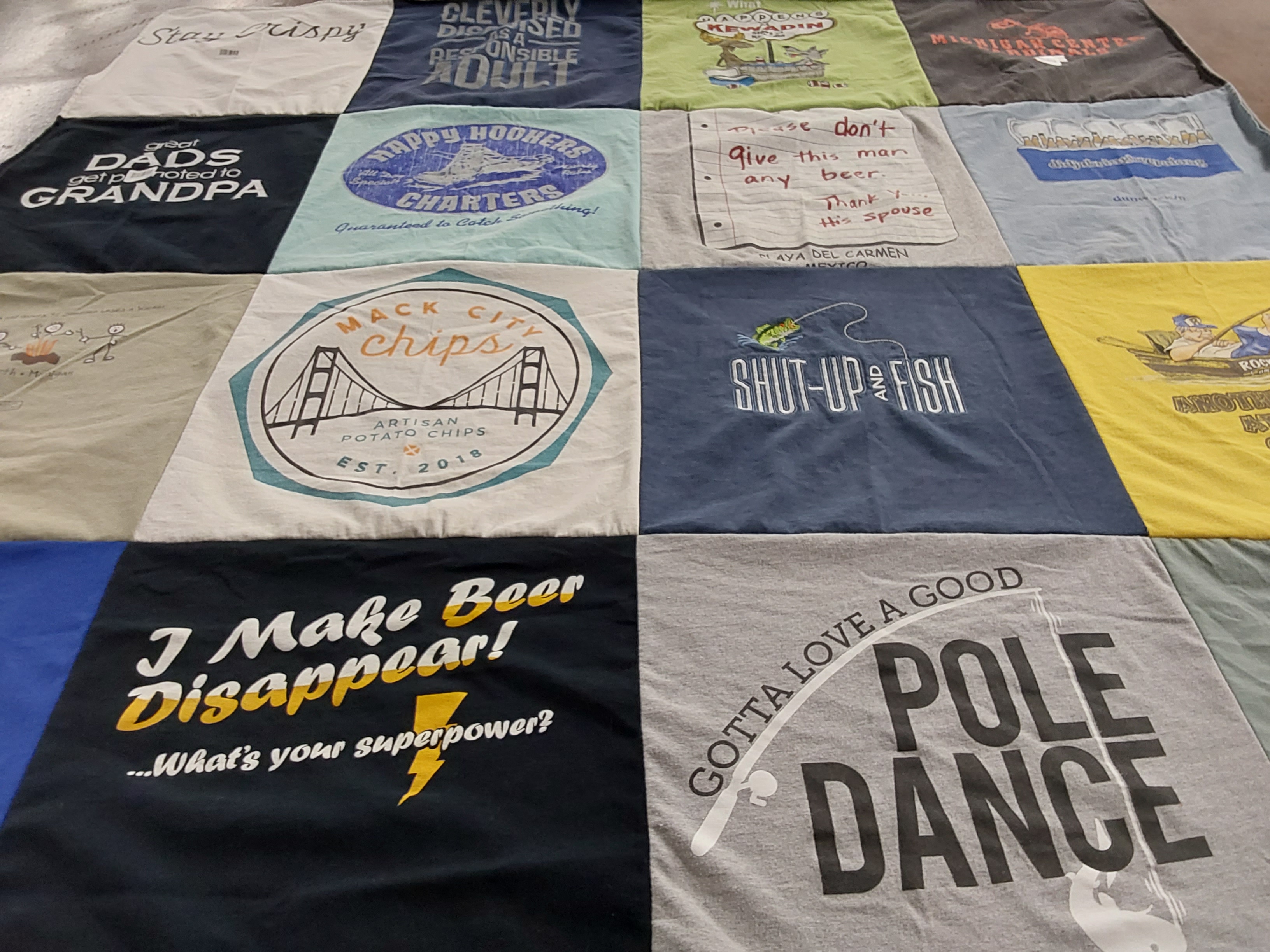 T-shirt quilt with fishing, cooking themes by Tina from FL