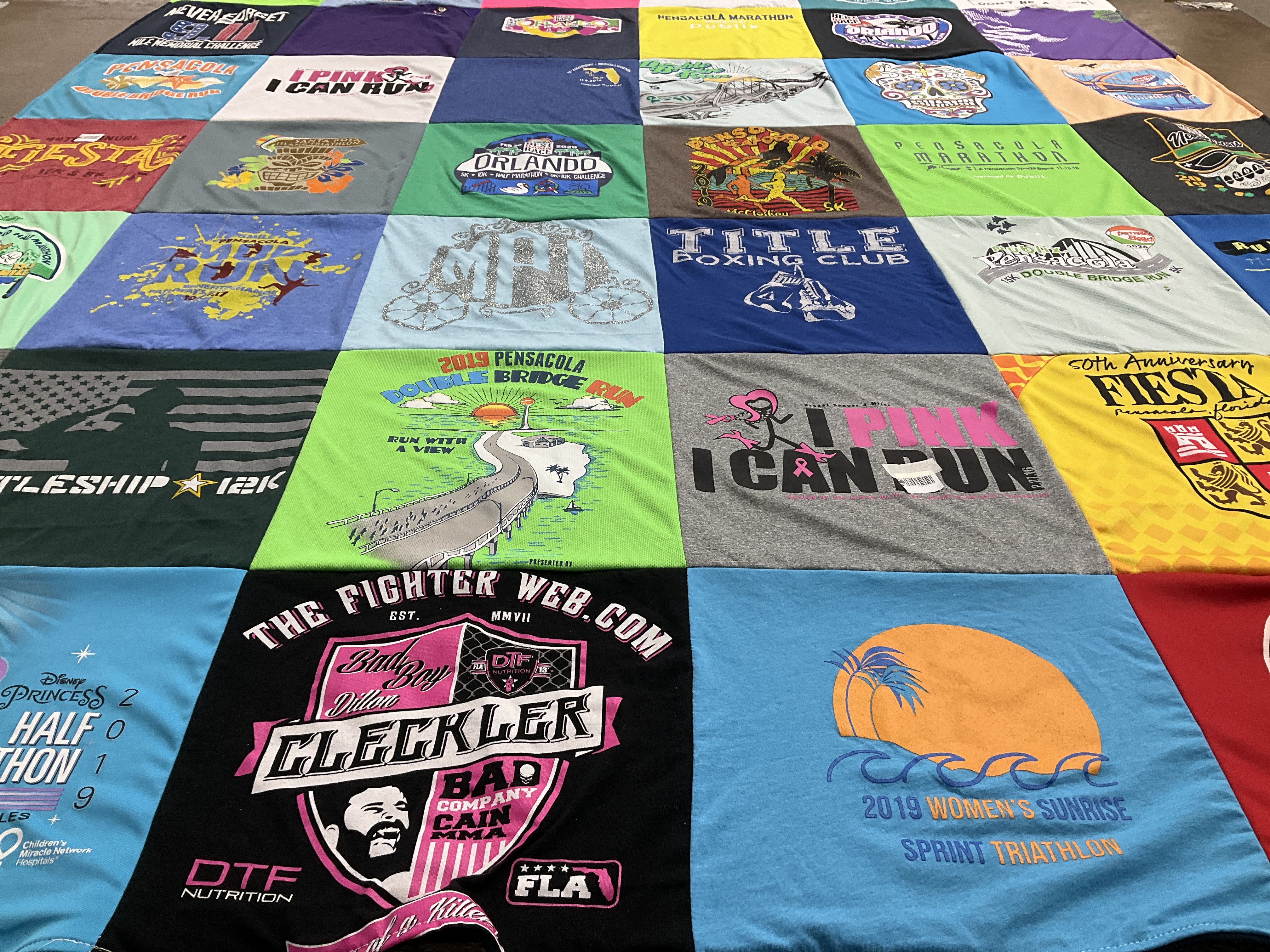 T-shirt quilt with running, fitness themes by Martha from FL