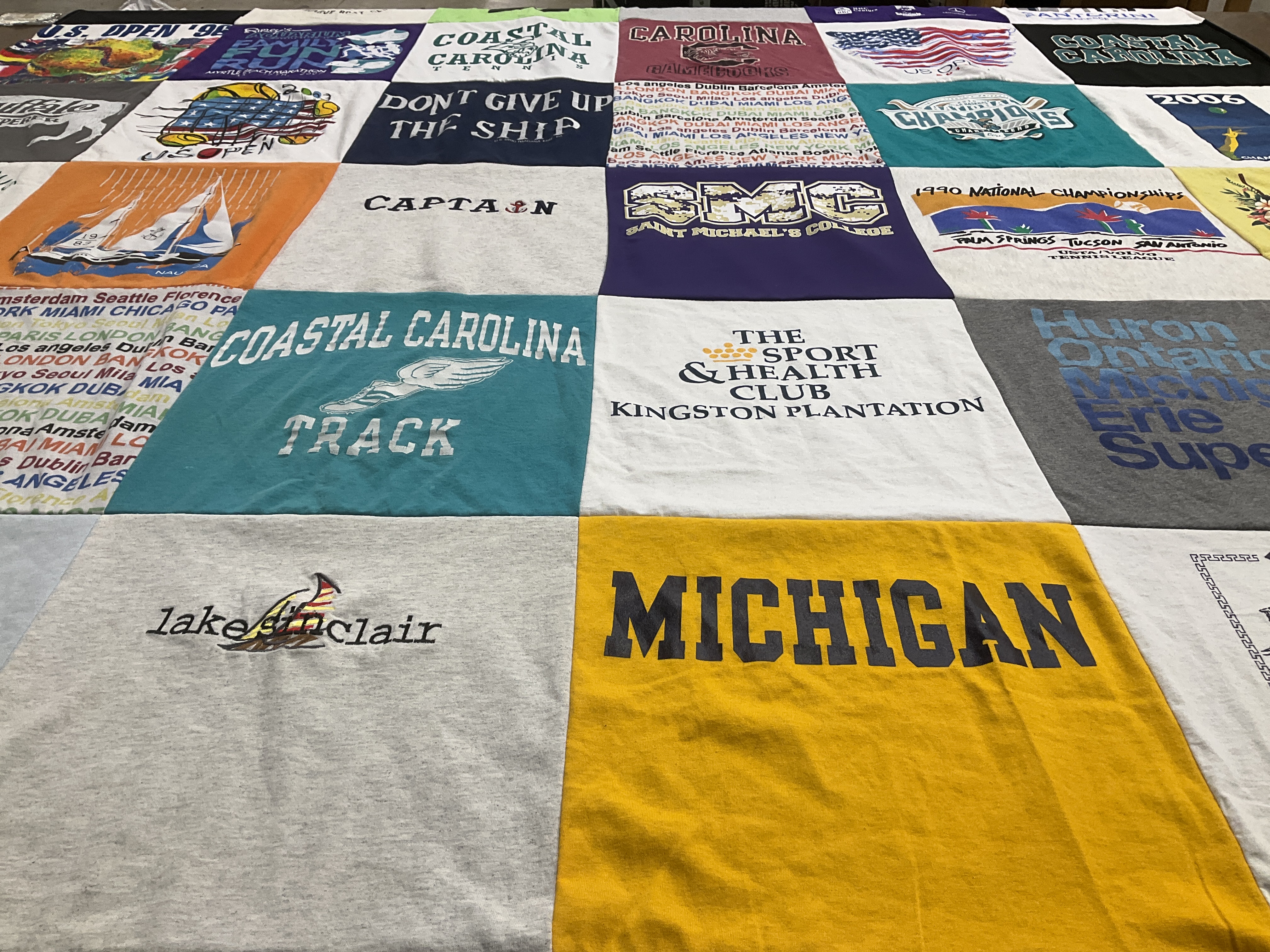 T-shirt quilt from coastal carolina university, university of michigan by Susan from SC