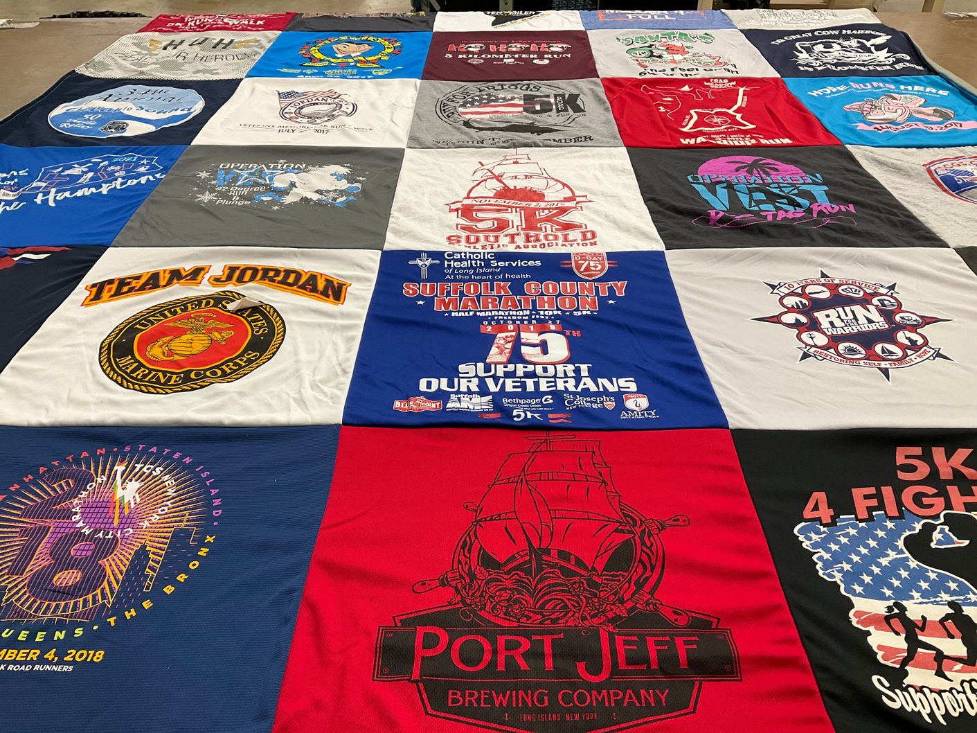 T-shirt quilt with running, community events themes by Kathy from NY