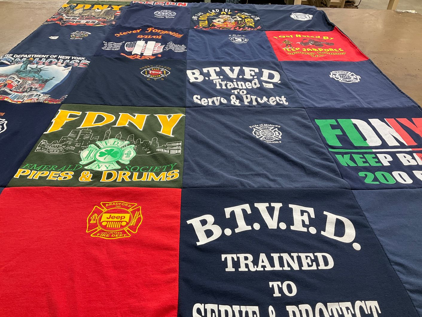 T-shirt quilt with firefighting, emergency services themes by Jean from PA
