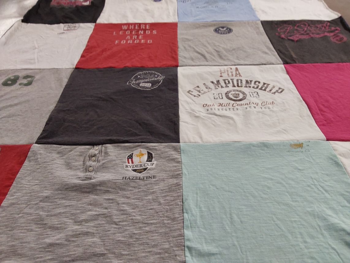 T-shirt quilt with golf themes by Meg from NJ