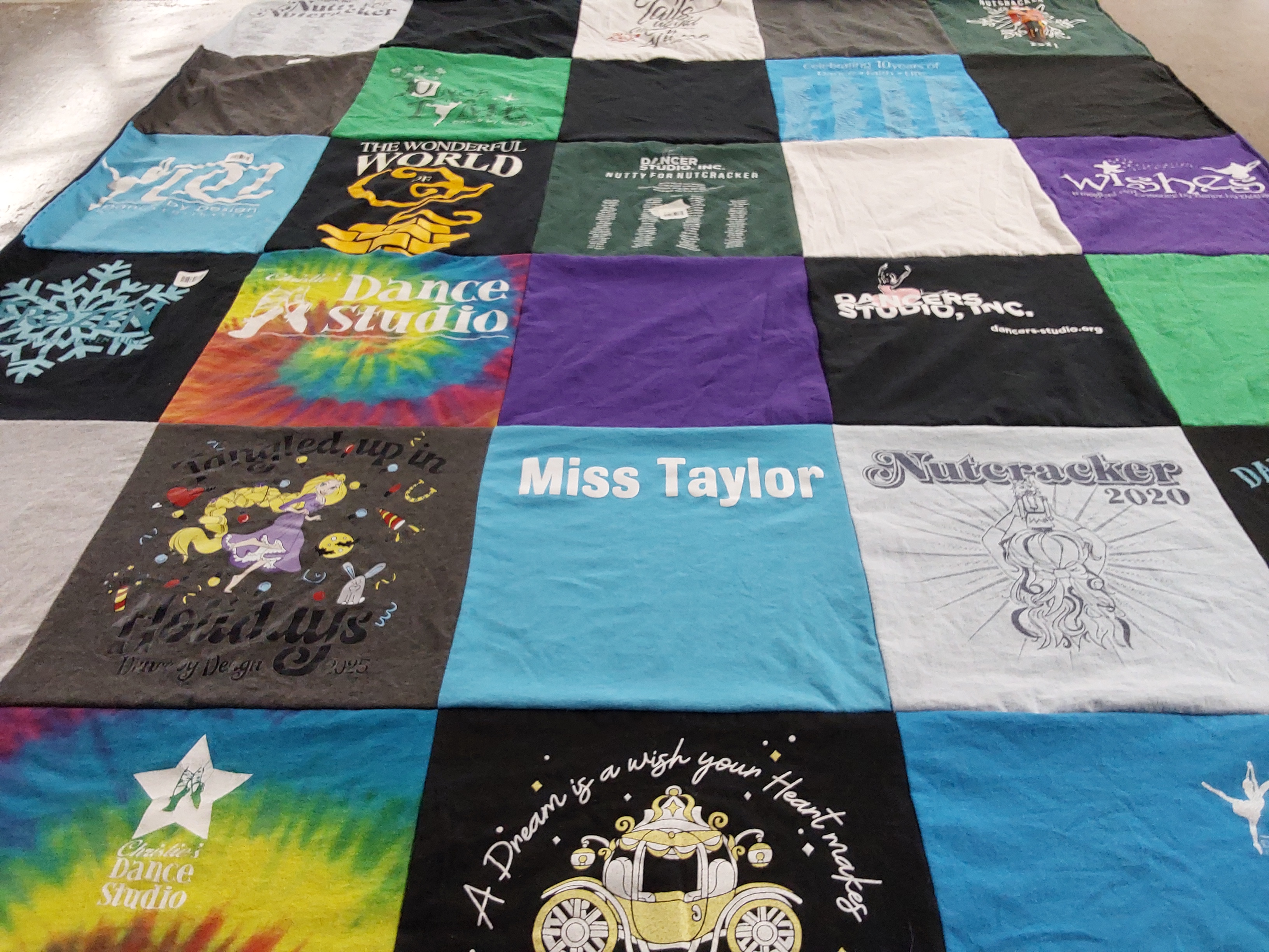 T-shirt quilt with dance, theater themes by Mileana from IN