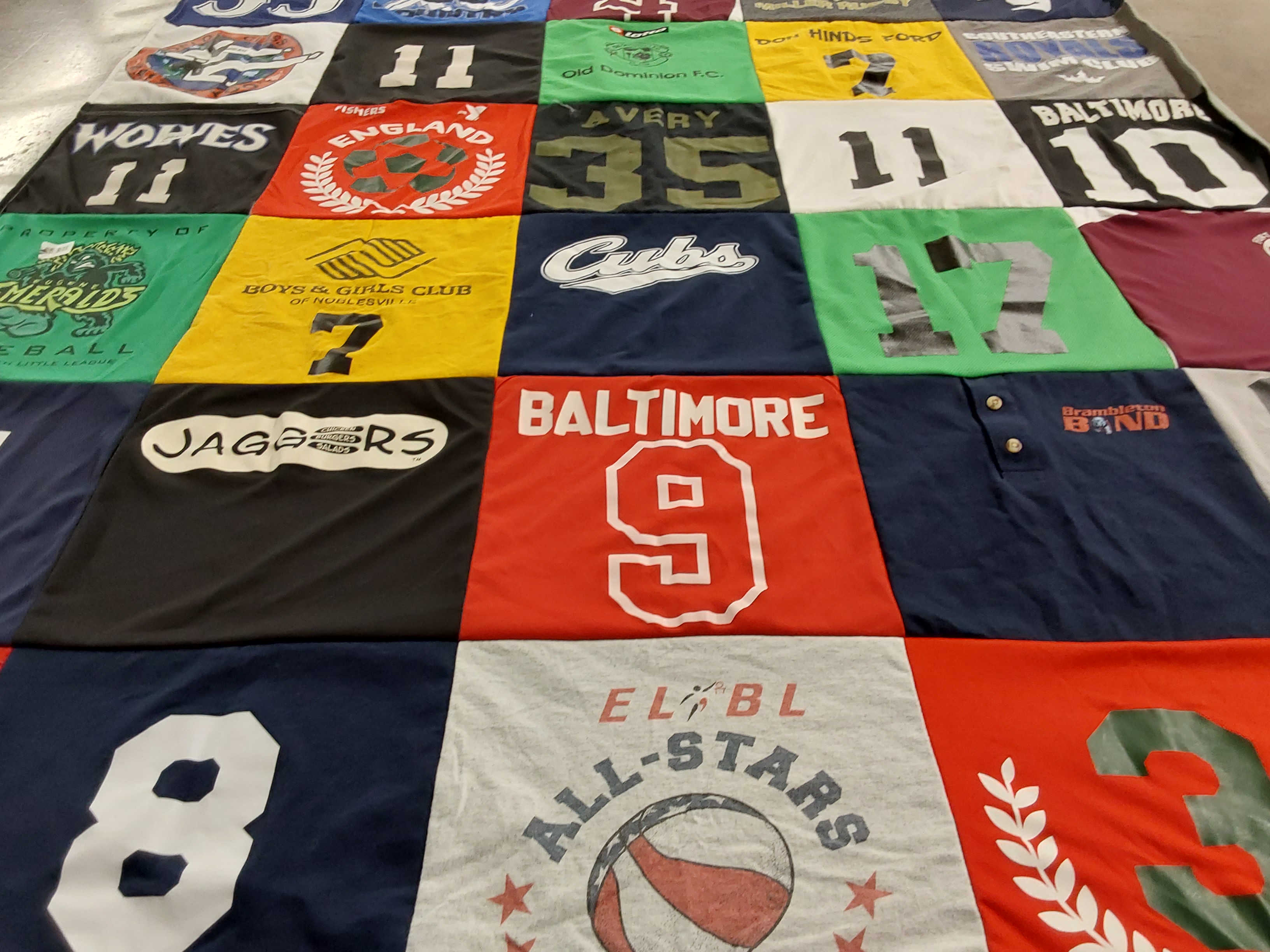 T-shirt quilt with soccer, baseball themes by Liska from IN