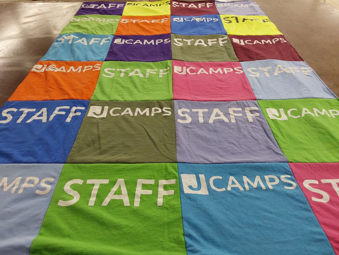 T-shirt quilt with camps, staffing themes by Maya from OH