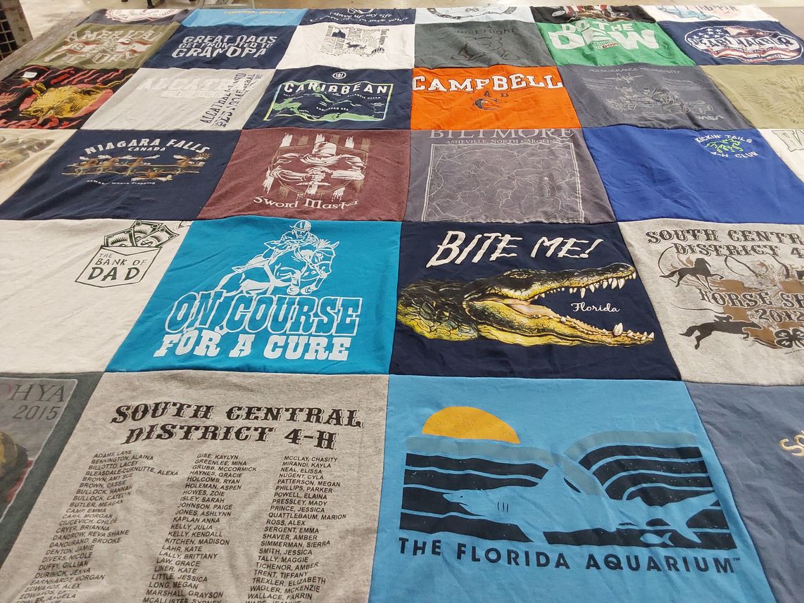 T-shirt quilt with fishing, boating themes by Tina from NC