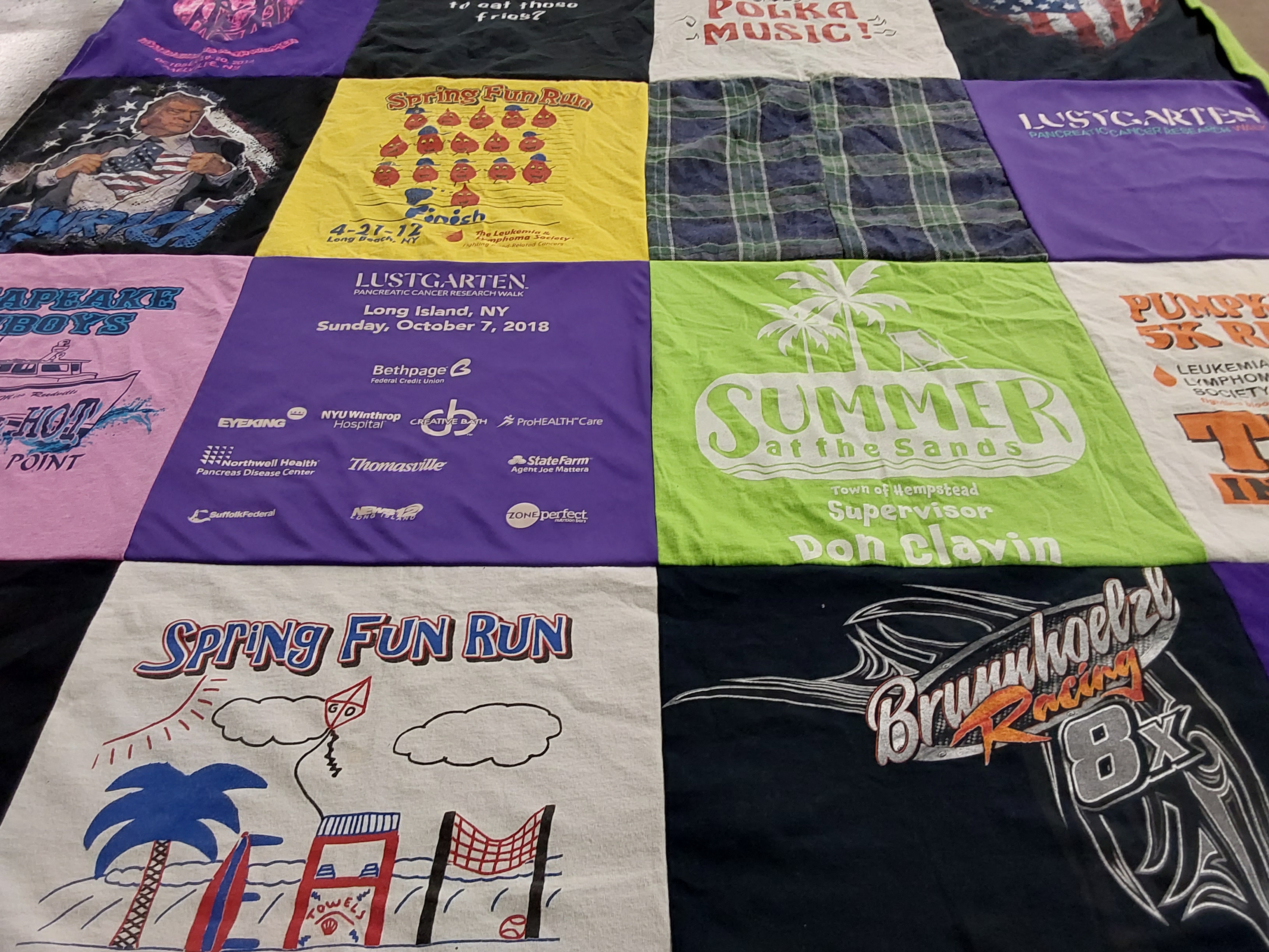 T-shirt quilt with running, fundraising themes by Deborah from NY