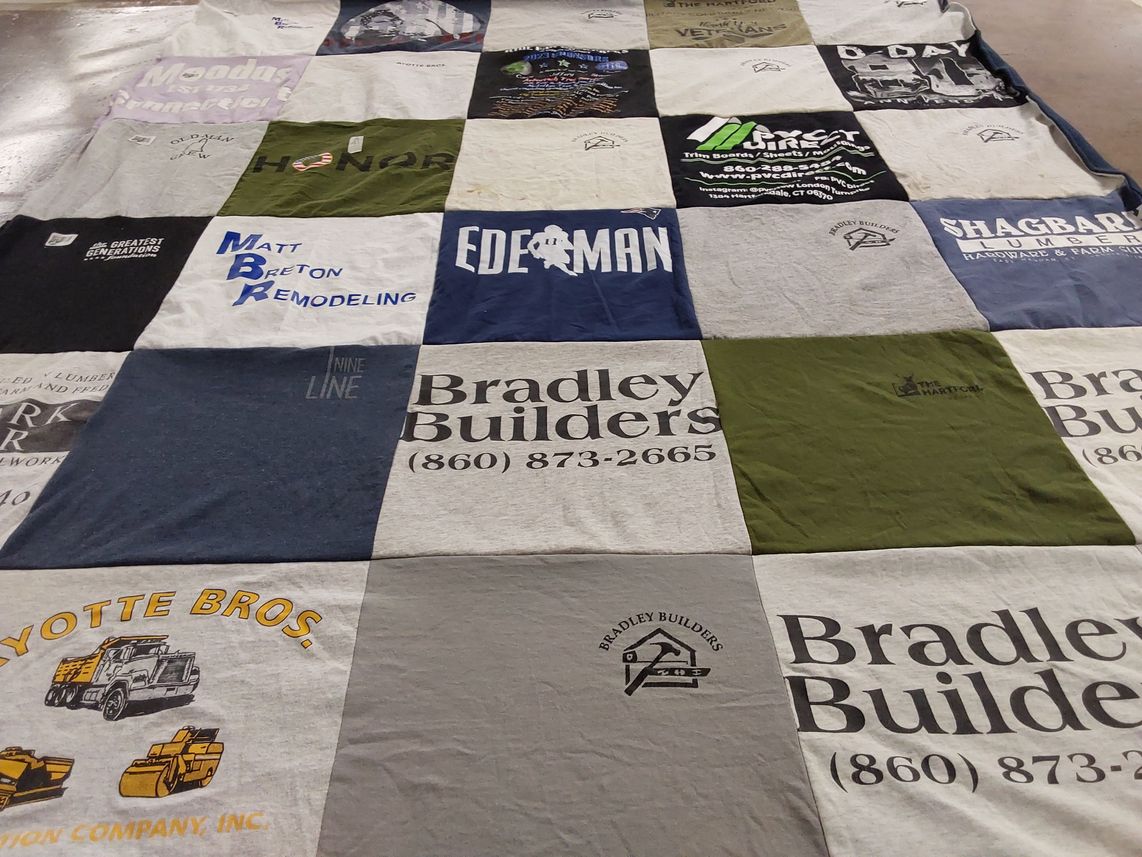 T-shirt quilt with construction, remodeling themes by Jeanne from CT