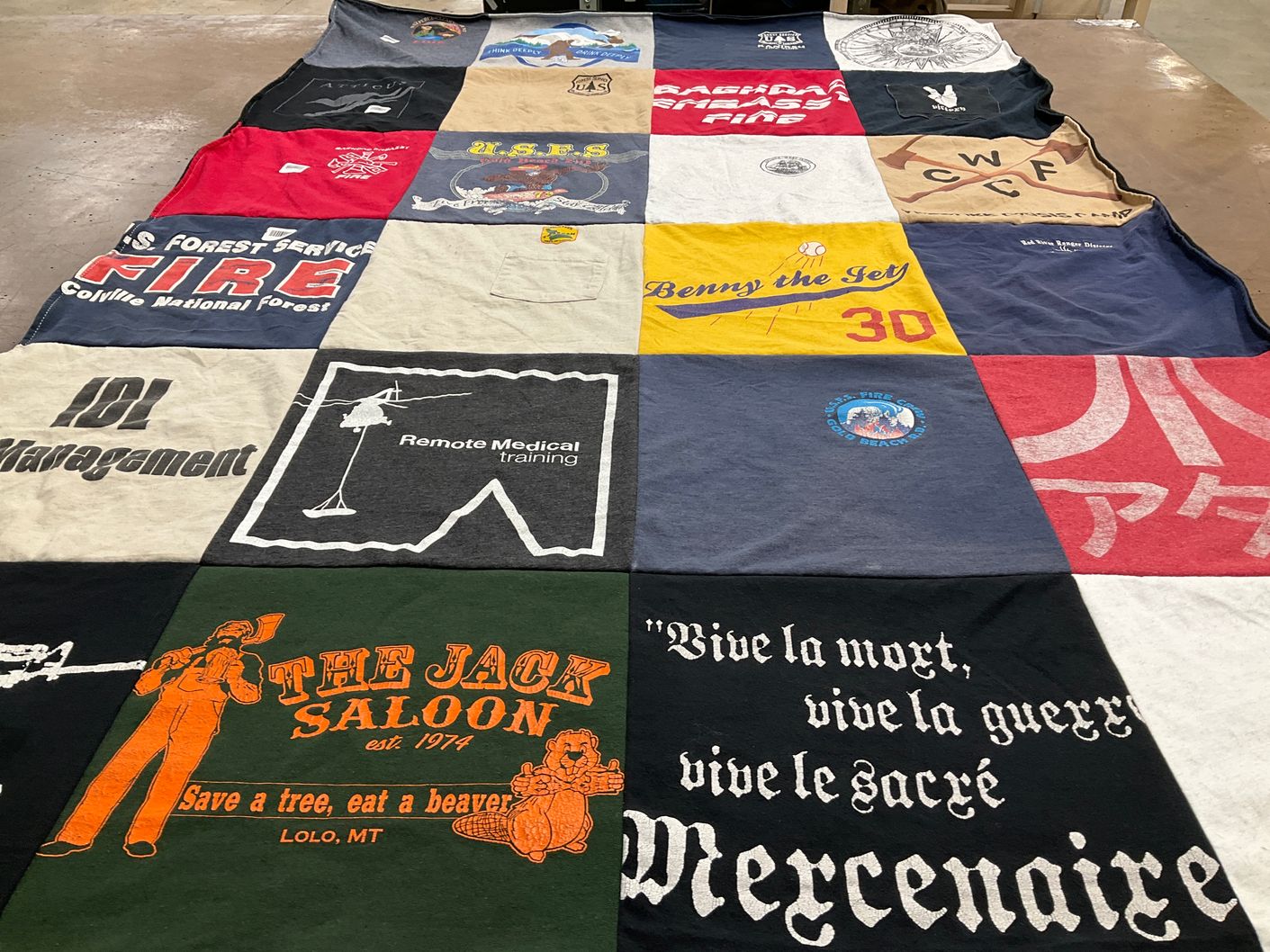 T-shirt quilt with firefighting, medical training themes by Katelyn from WA