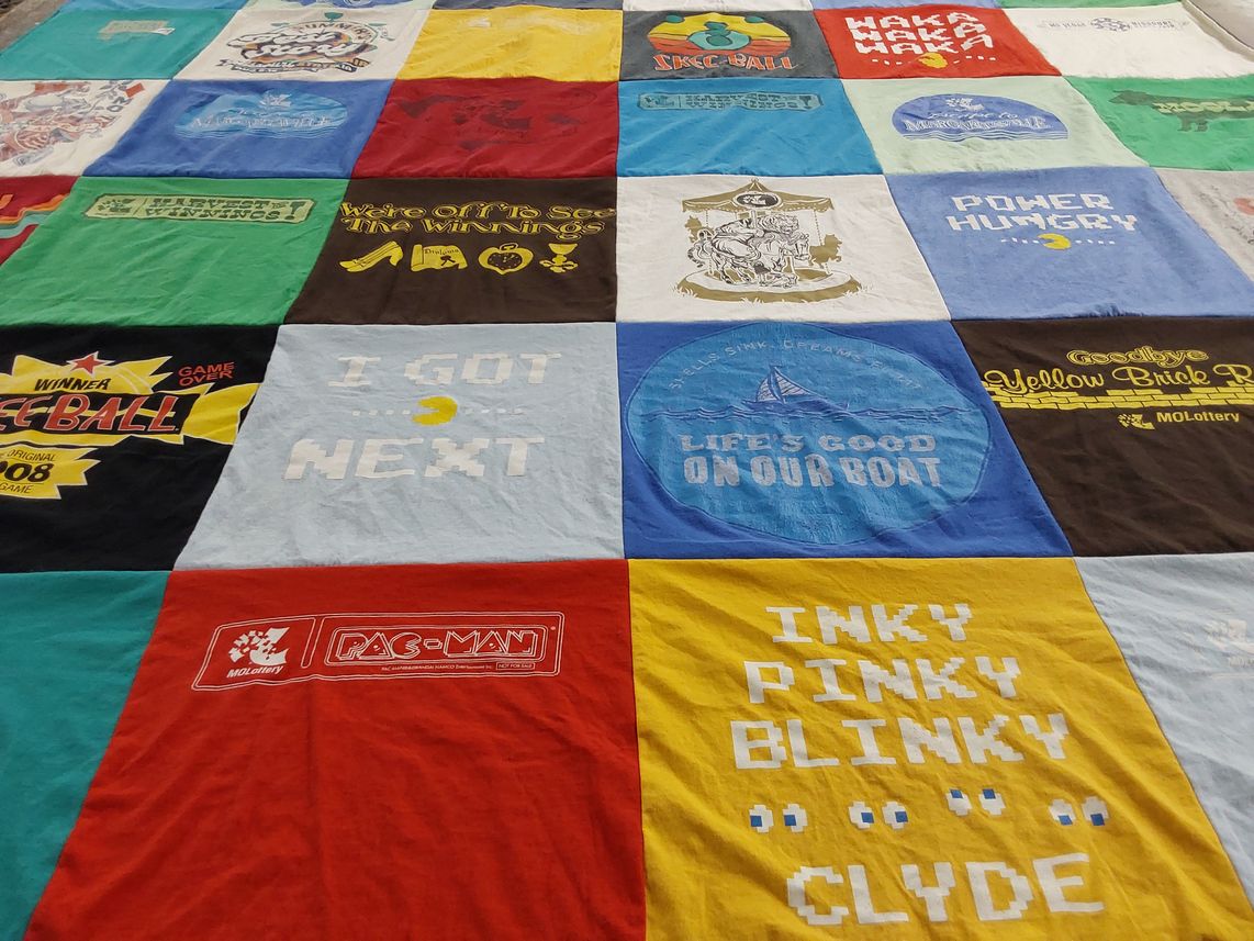 T-shirt quilt with gaming, boating themes by Adrian from MO